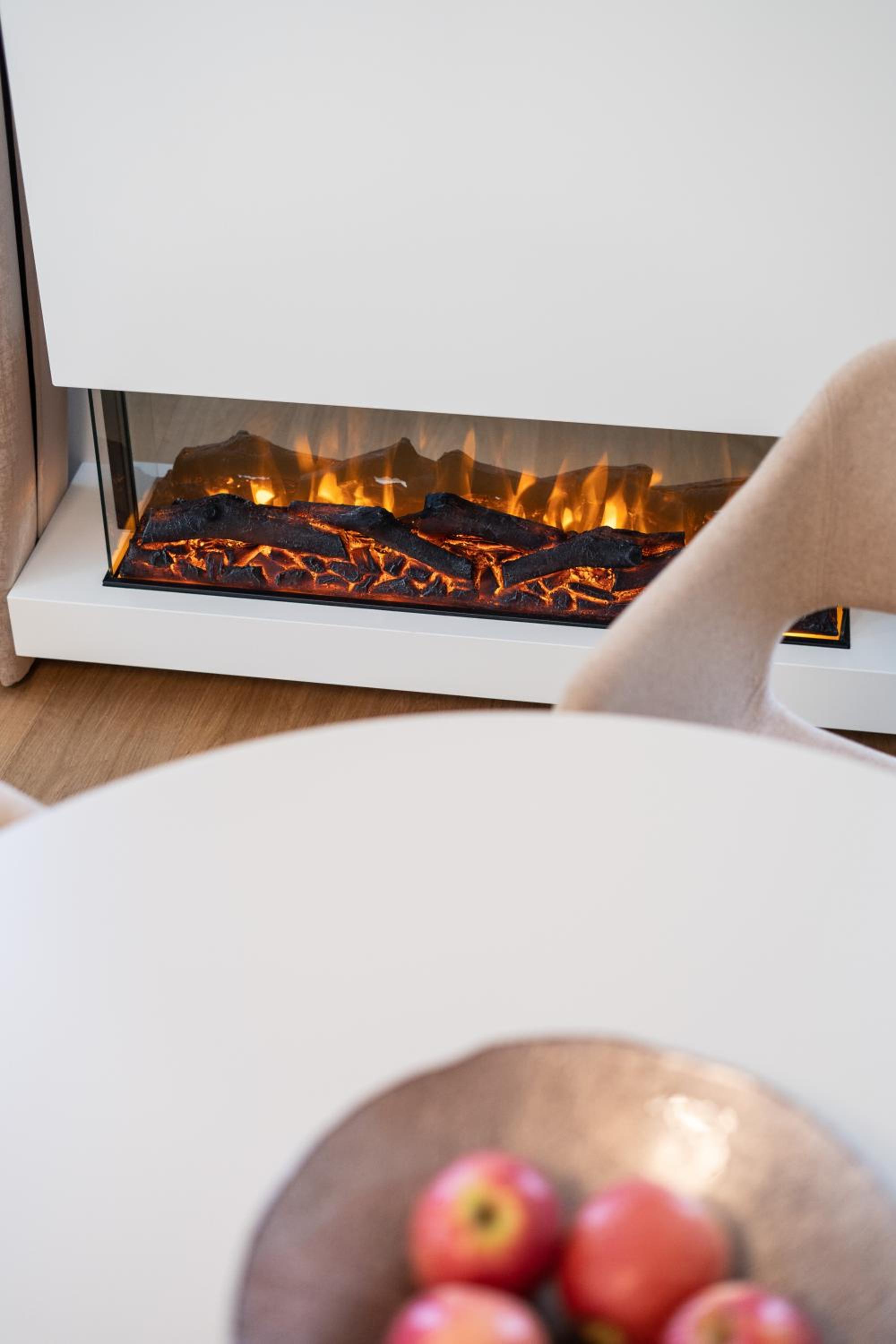 Family room with electric fireplace and balcony - Photo 2