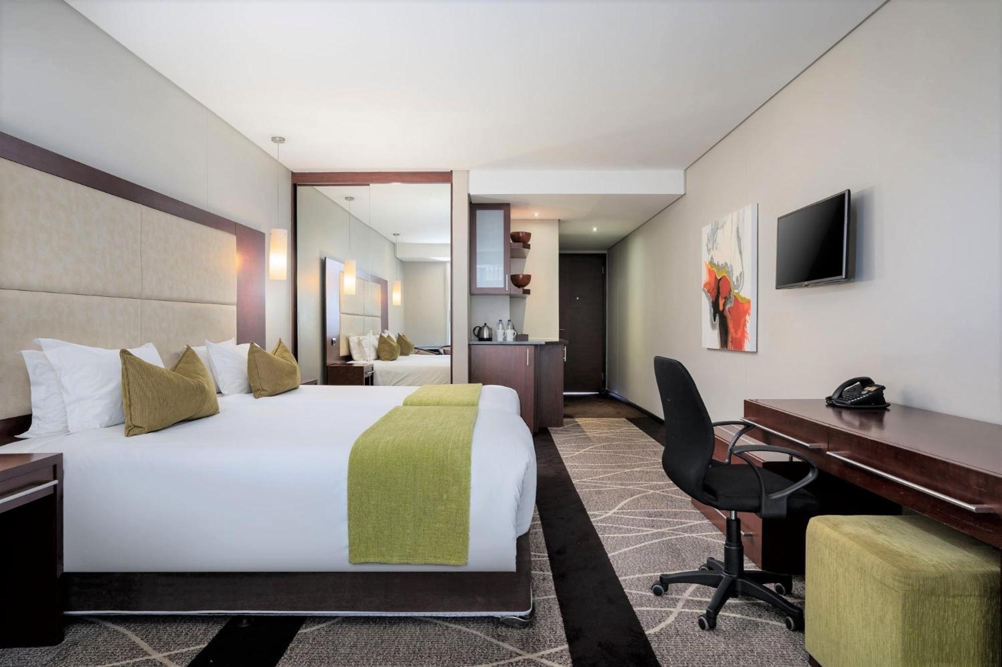 Standard Room with Two 3/4 Beds - Photo 1