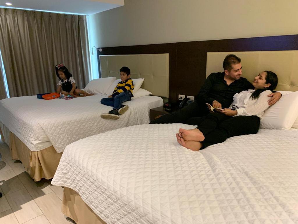 Deluxe Queen Room With Two Queen Beds photo 2