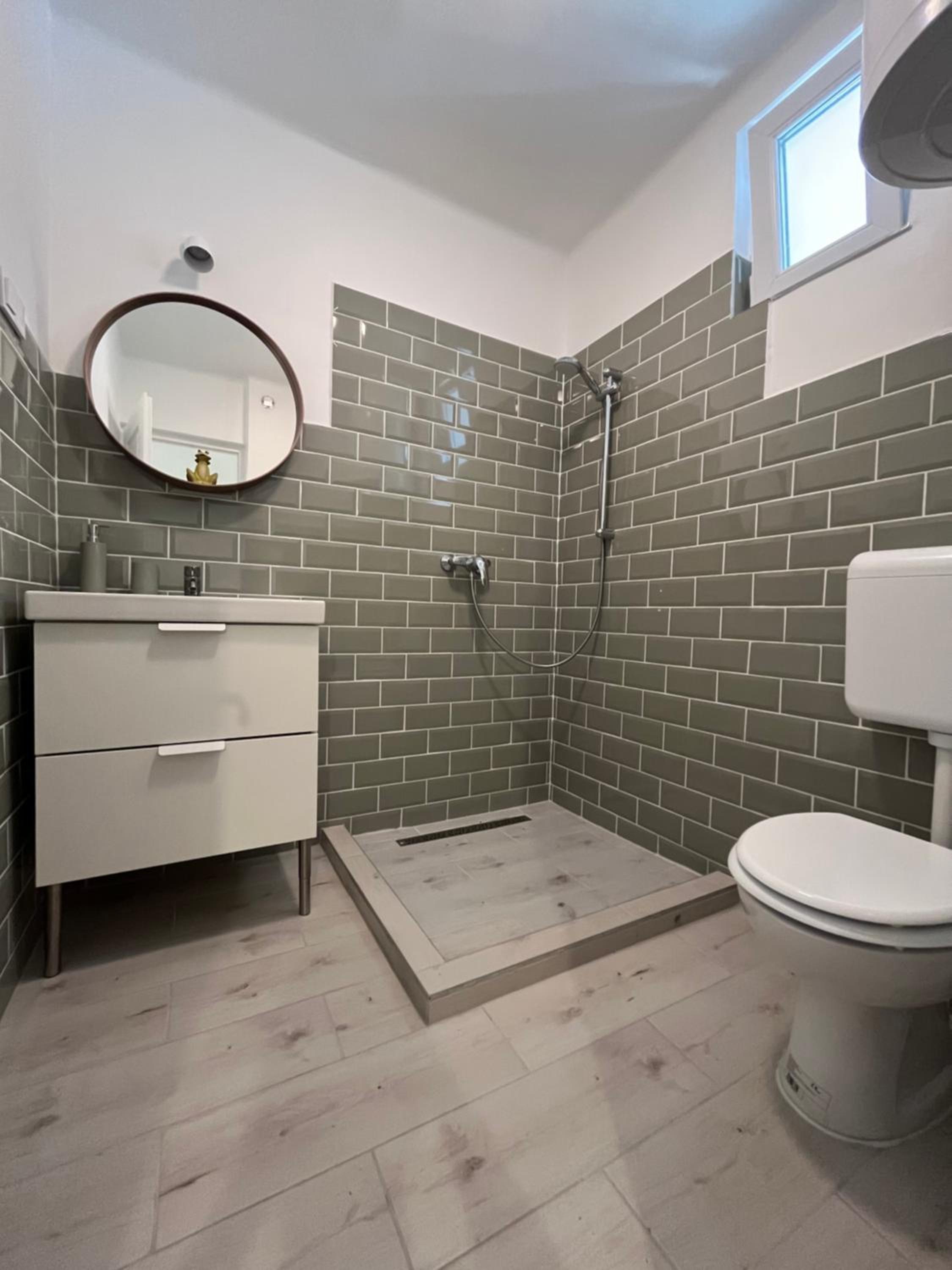 Three-Bedroom Apartment - Photo 2