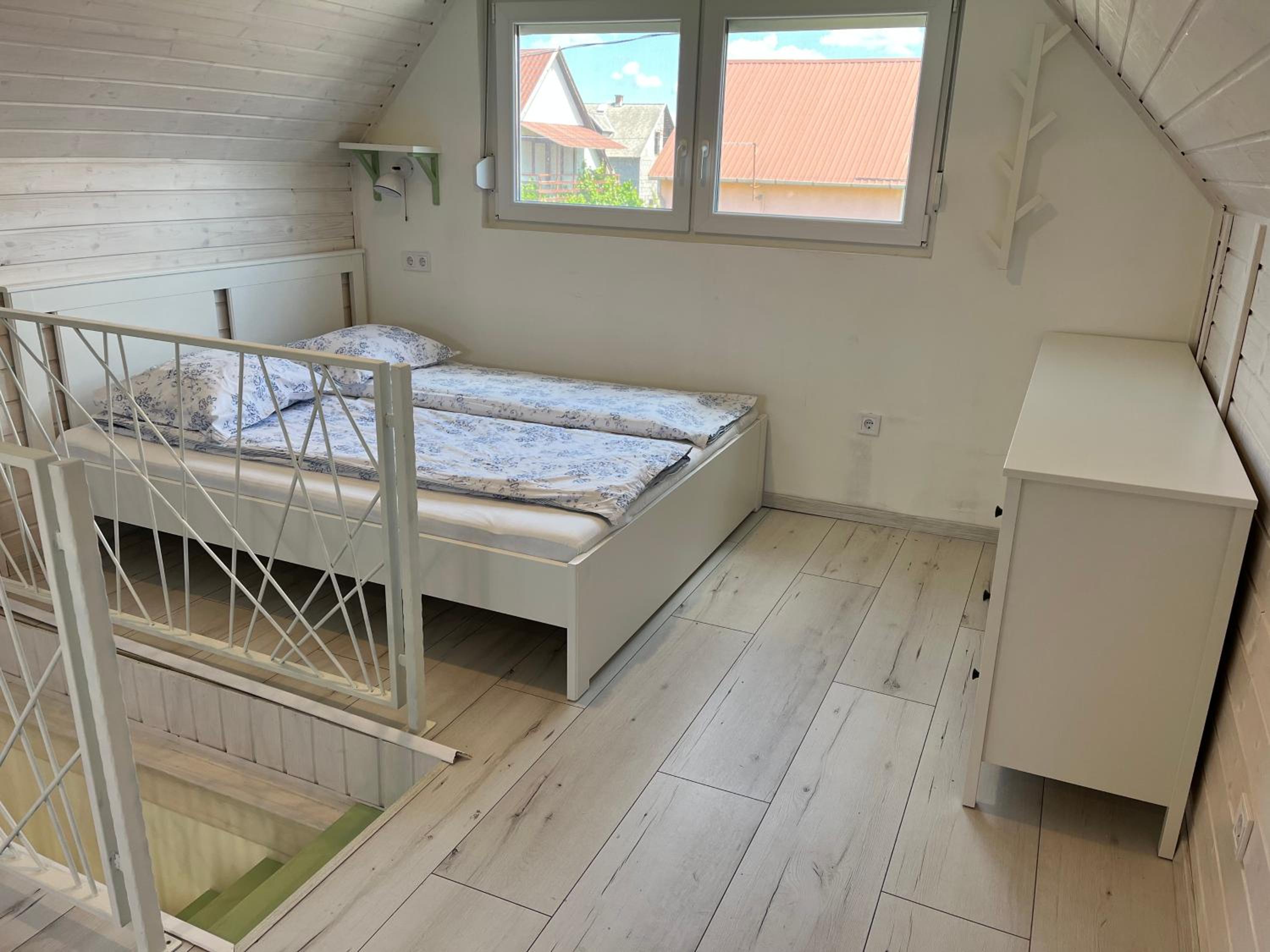 Three-Bedroom Apartment - Photo 40