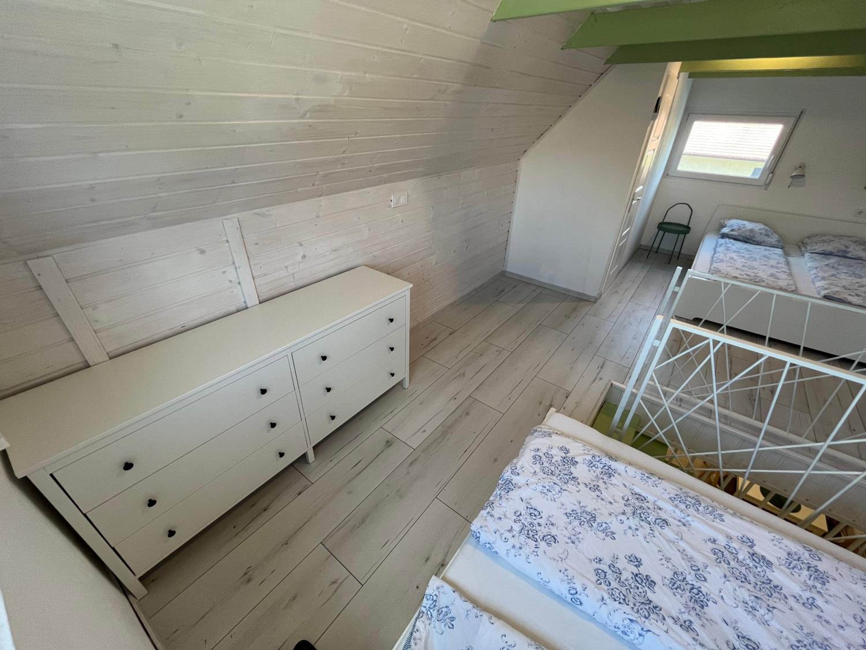 Three-Bedroom Apartment - Photo 38