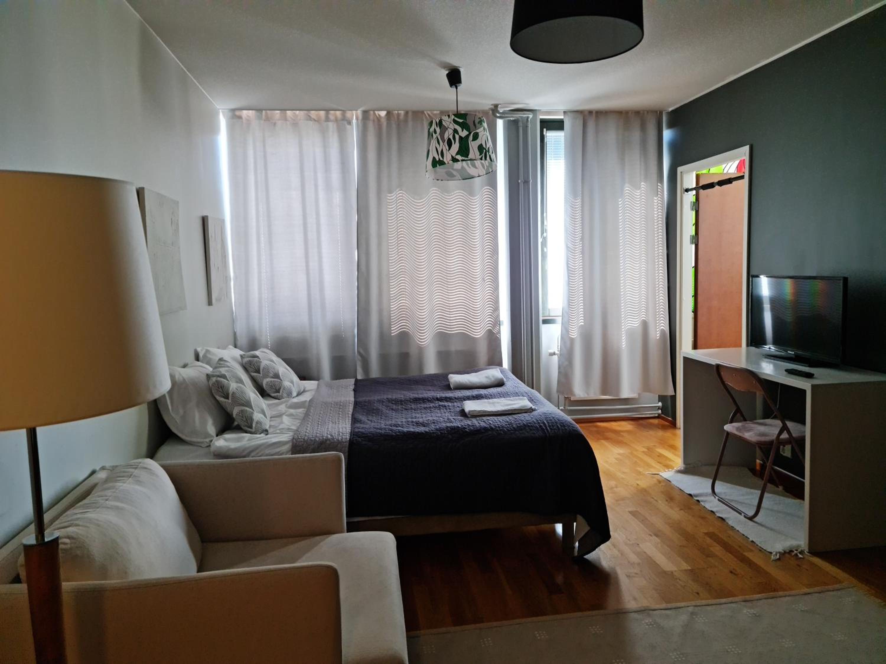 Three-Bedroom Apartment - Photo 12