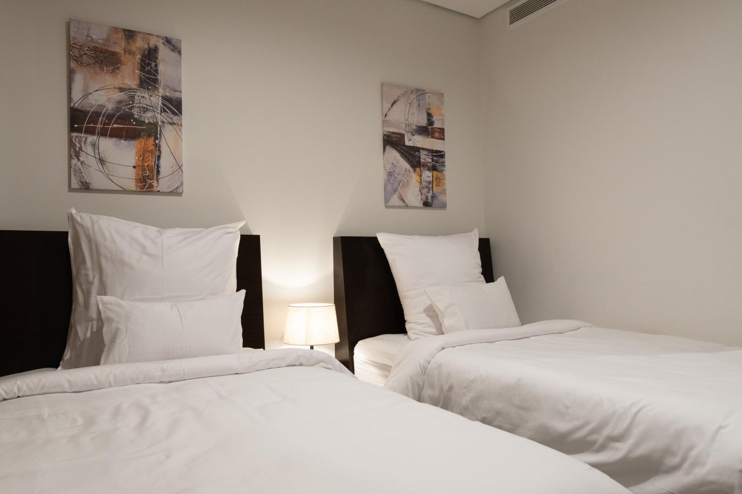 Three-Bedroom Apartment - Photo 9