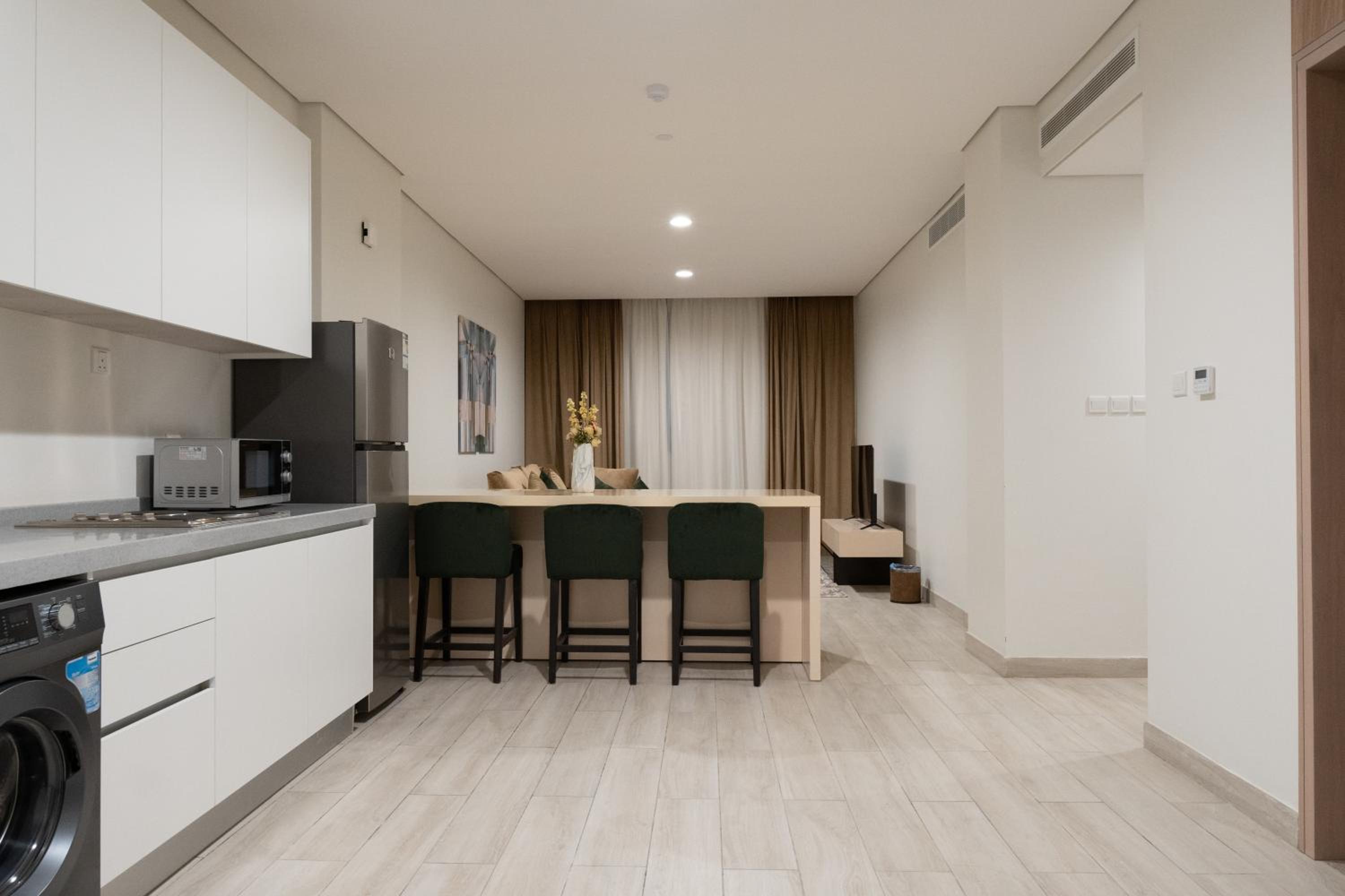 Three-Bedroom Apartment - Photo 5
