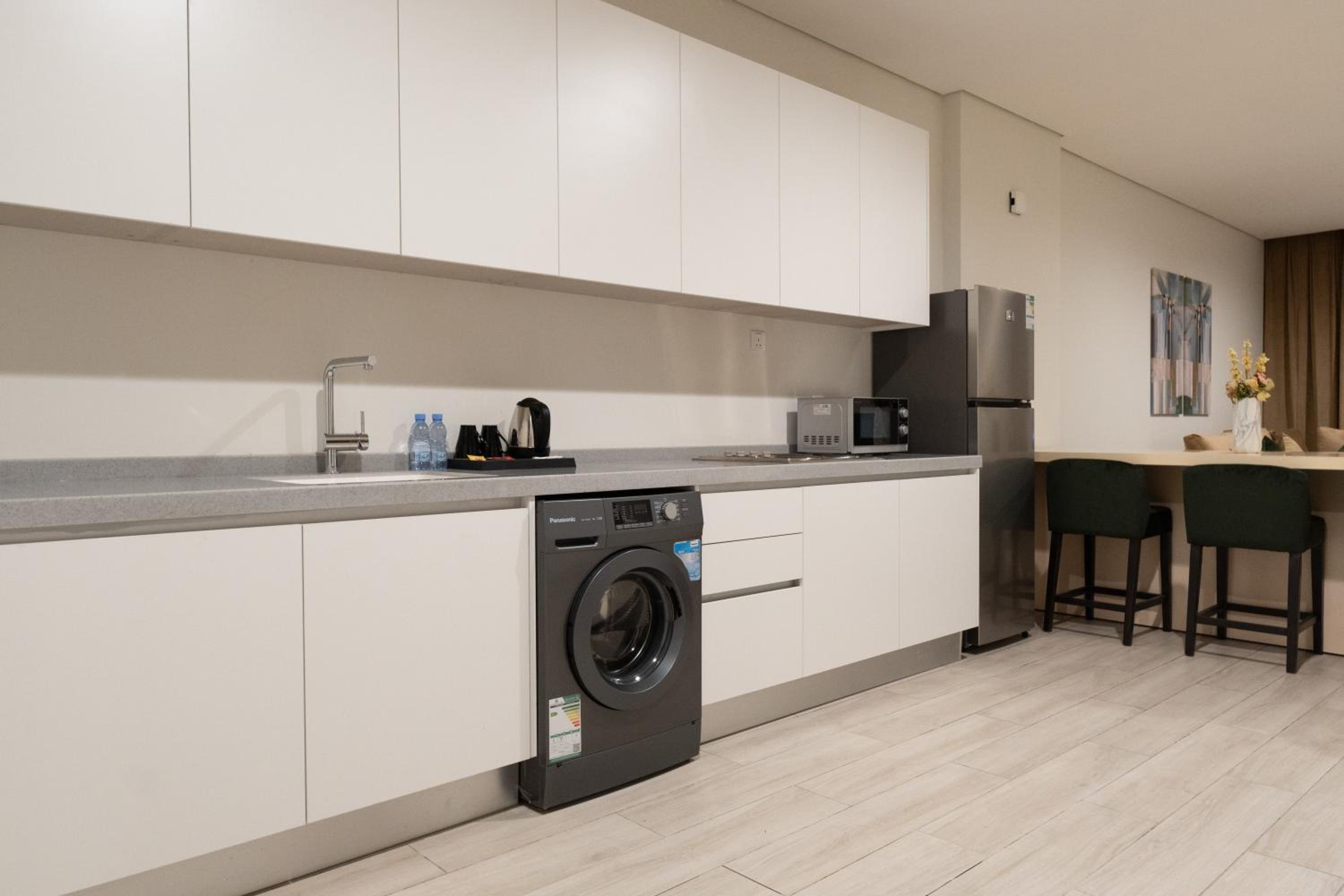 Three-Bedroom Apartment - Photo 3
