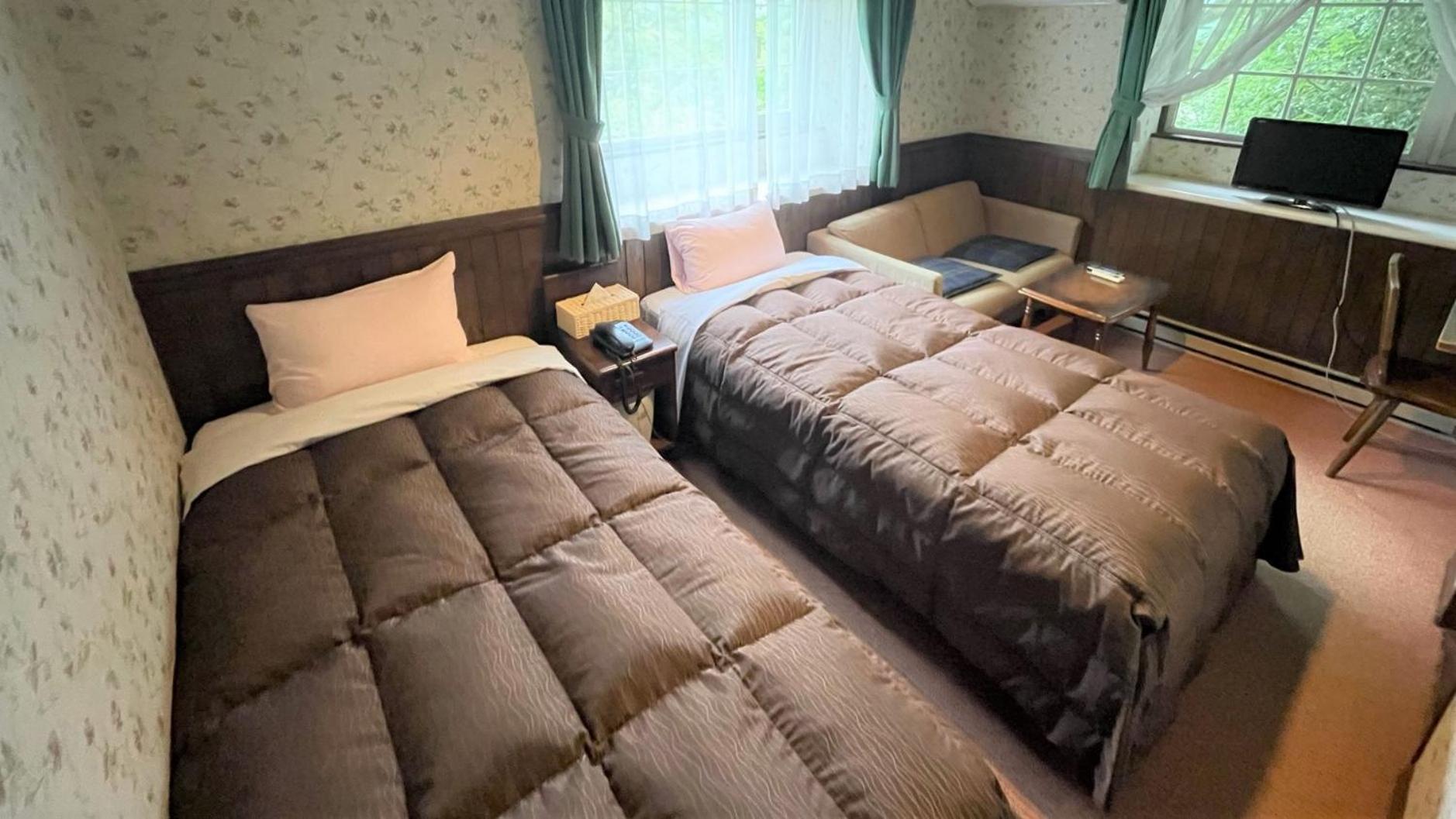 Twin Room - Photo 1