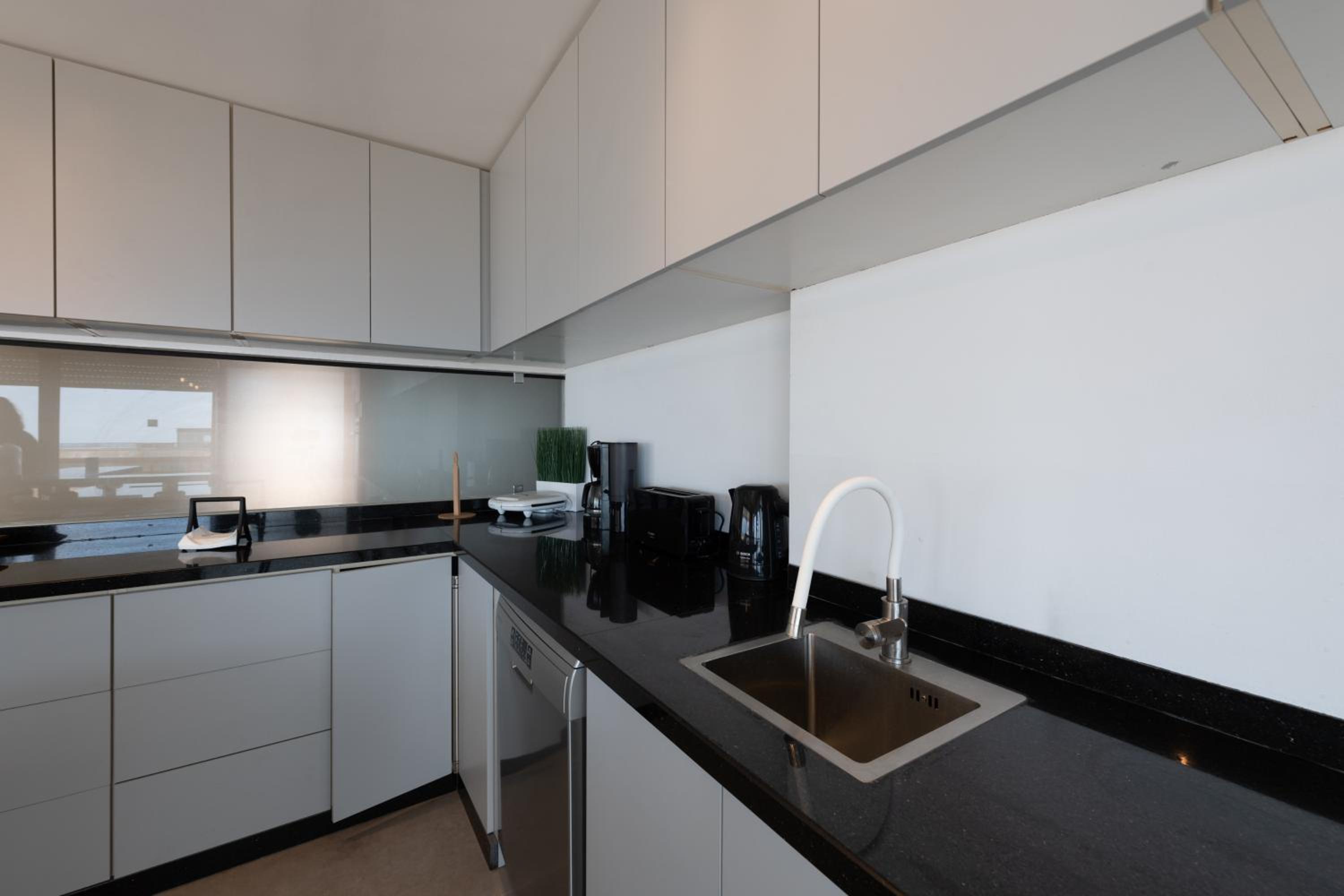 Three-Bedroom Apartment - Photo 14