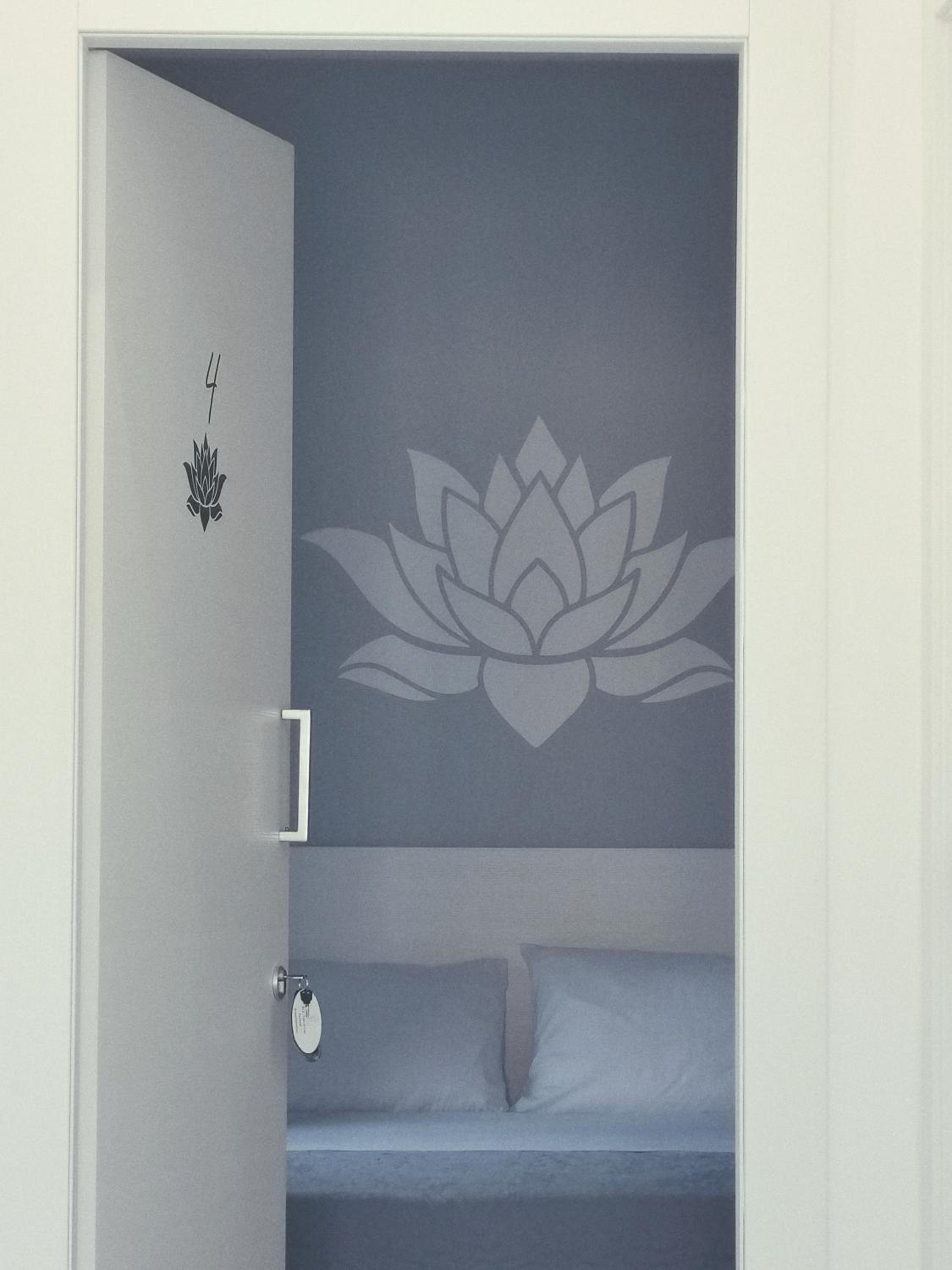 Quadruple Room with Balcony photo 3