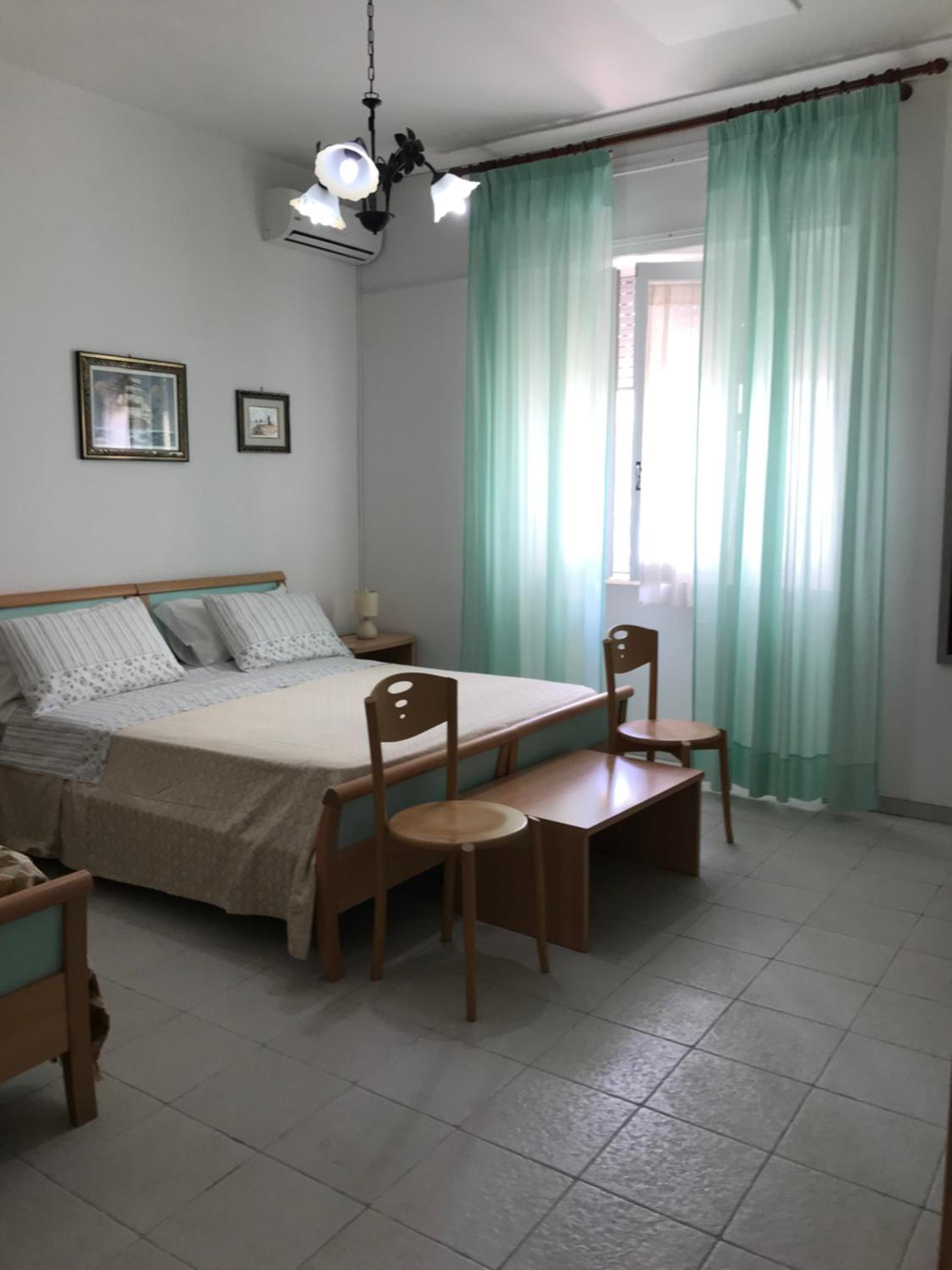 Quadruple Room - Photo 23