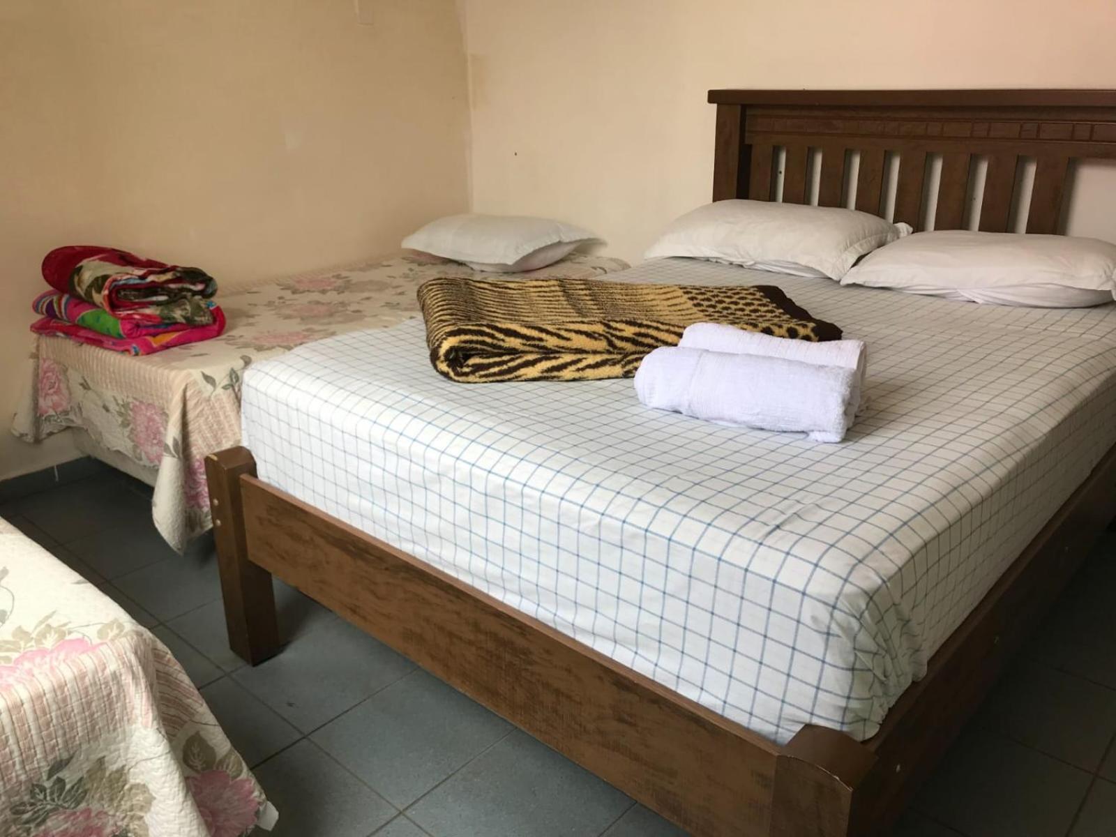 Economy Triple Room photo 2
