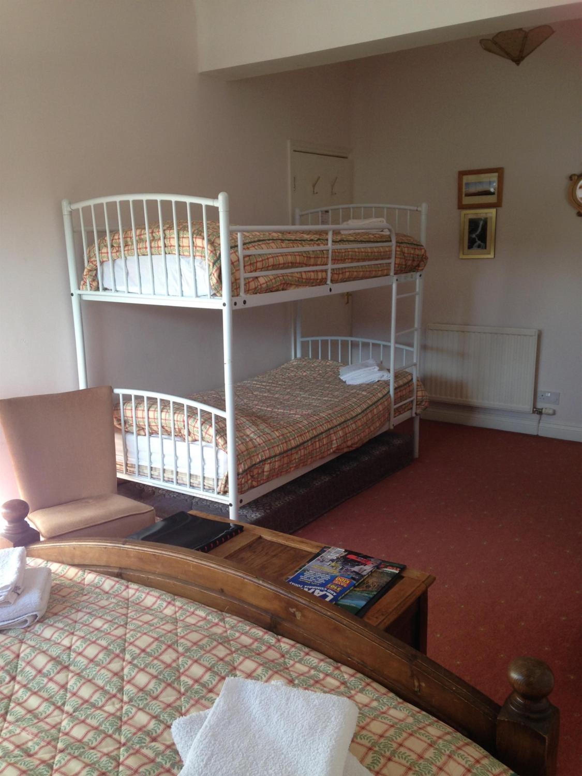 Quadruple Room with Private Bathroom - Photo 1