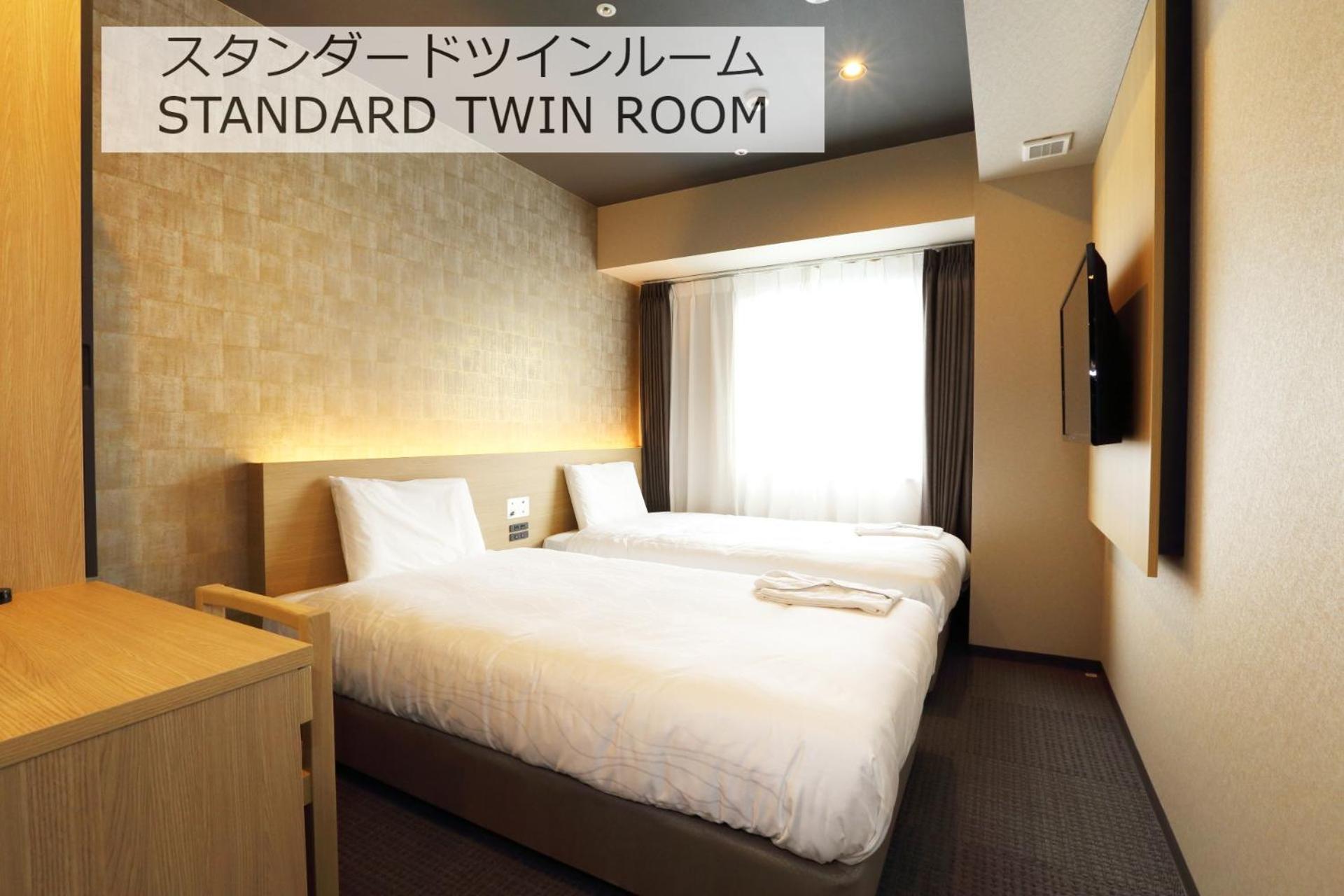 Standard Twin Room - Photo 6