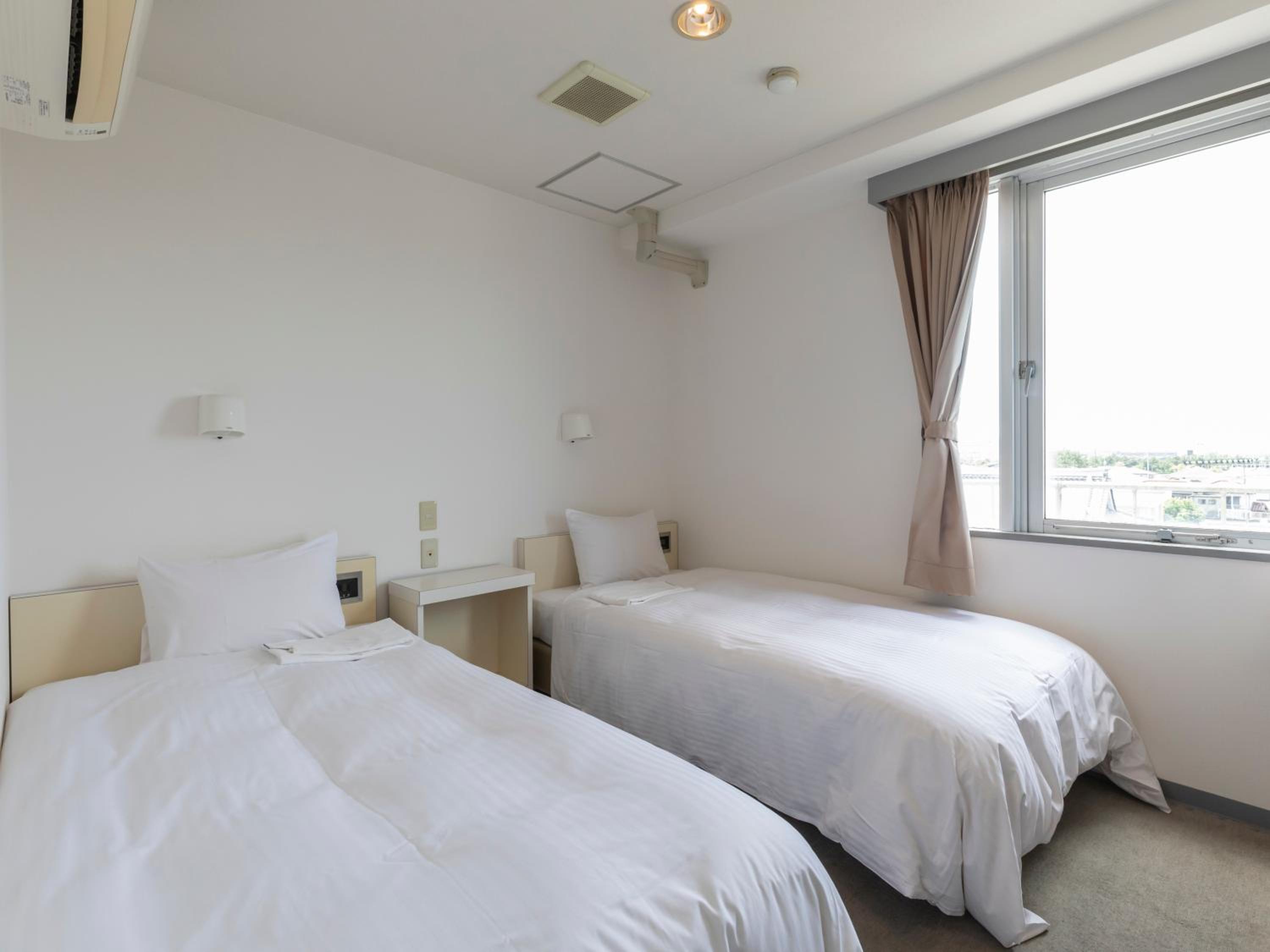 Twin Room - Smoking - Photo 1