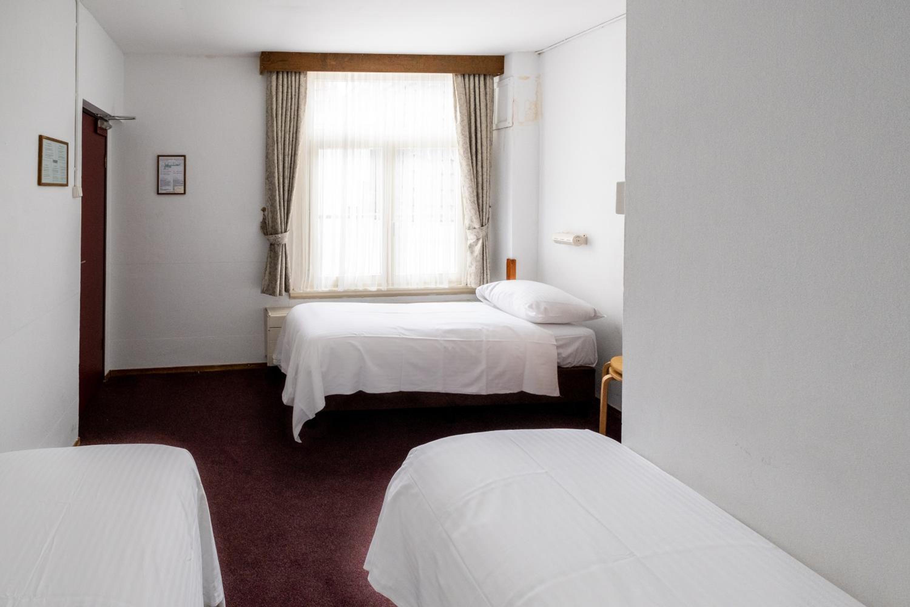 Basic Triple Room photo 3
