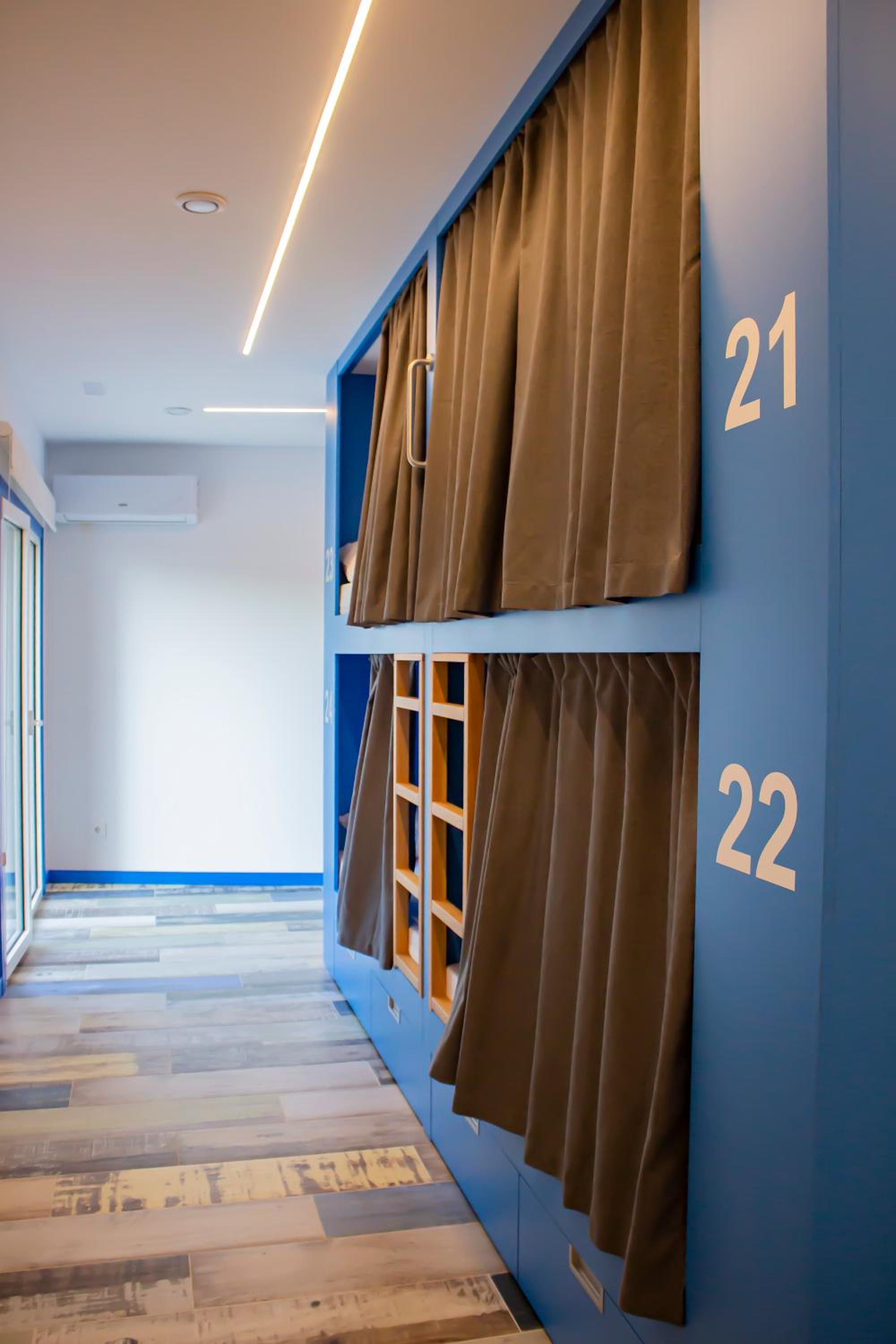 Cama en Dormitorio Mixto de 10 Camas