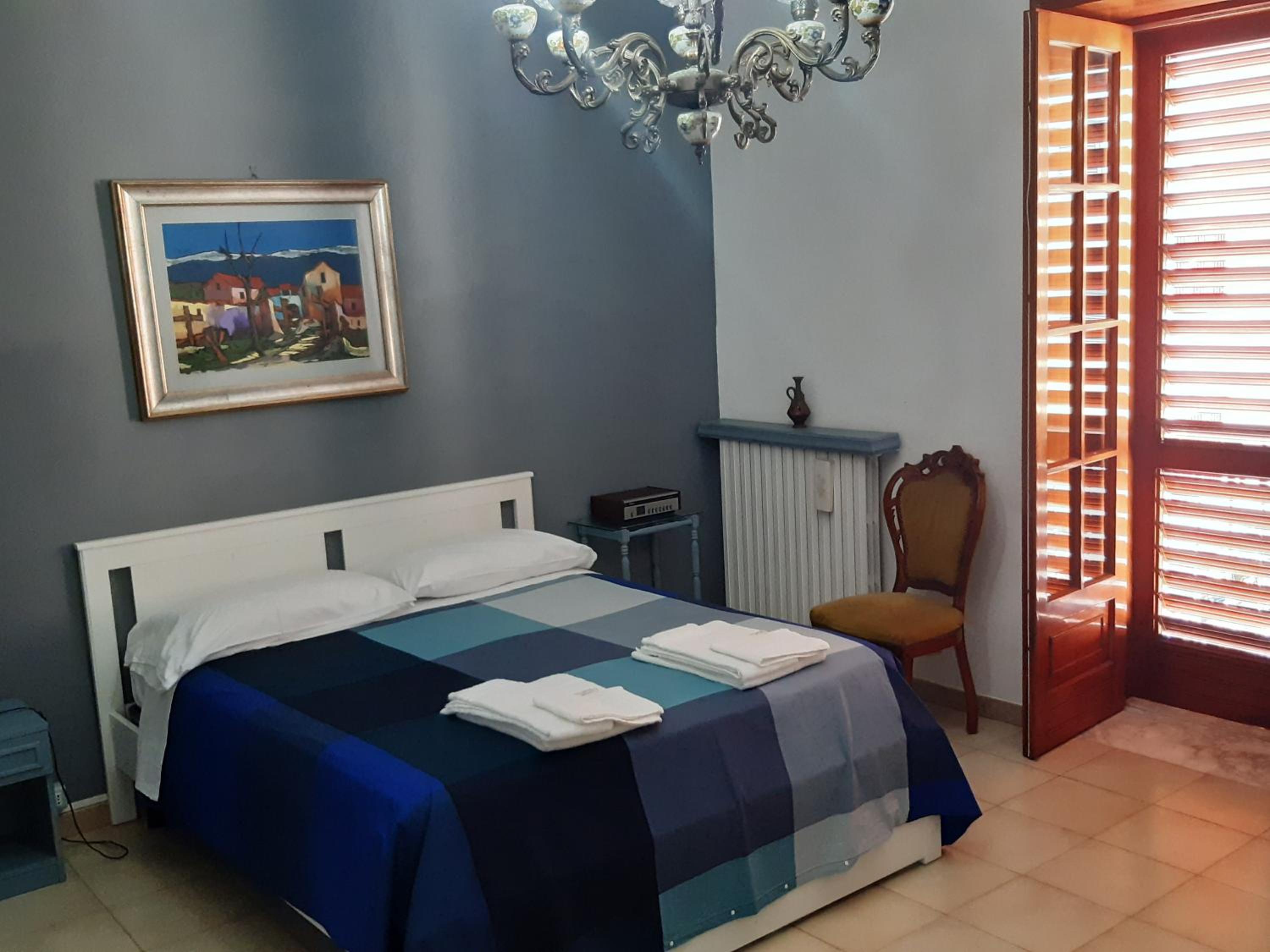Three-Bedroom House - Photo 25