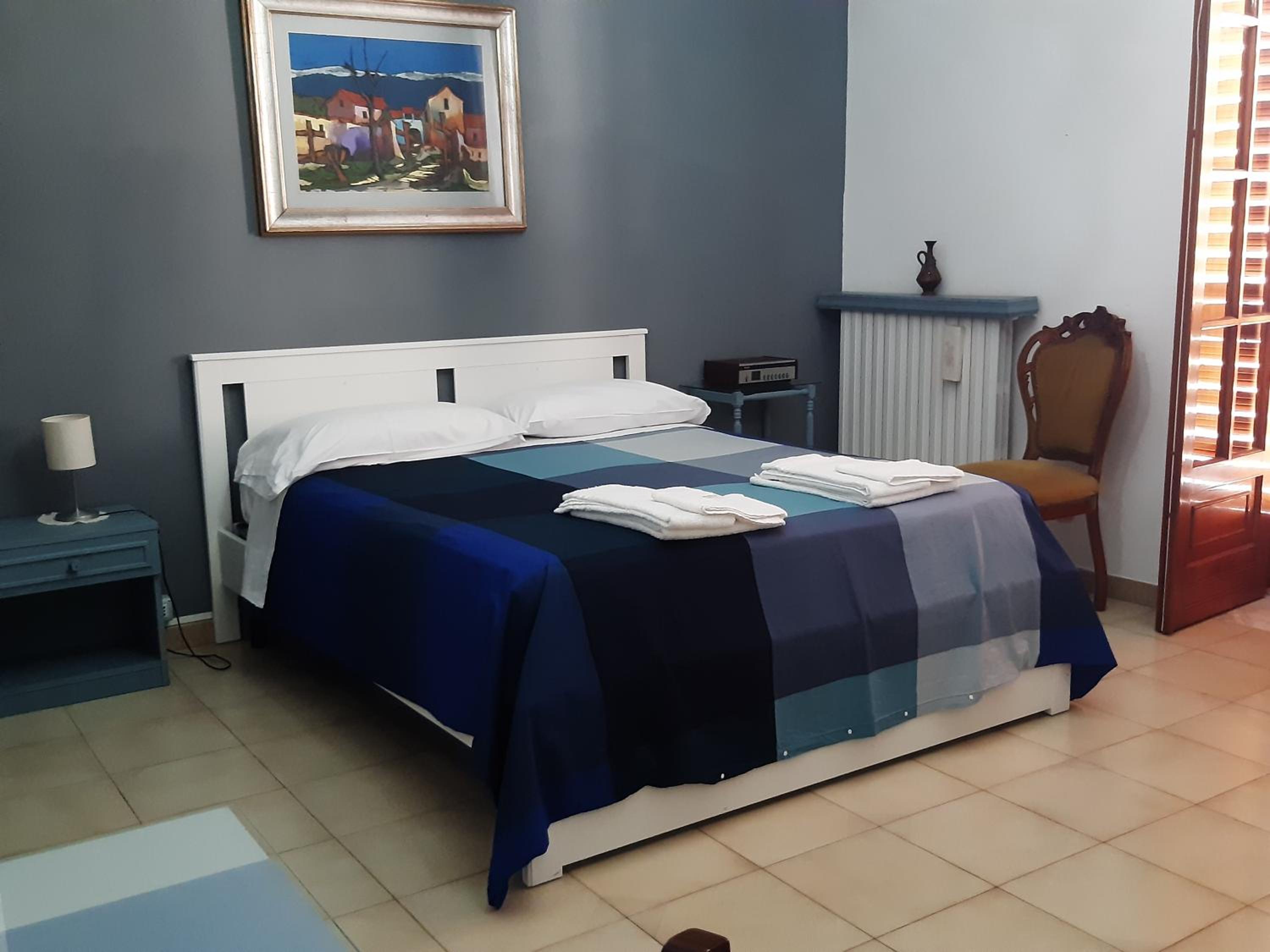 Three-Bedroom House - Photo 26
