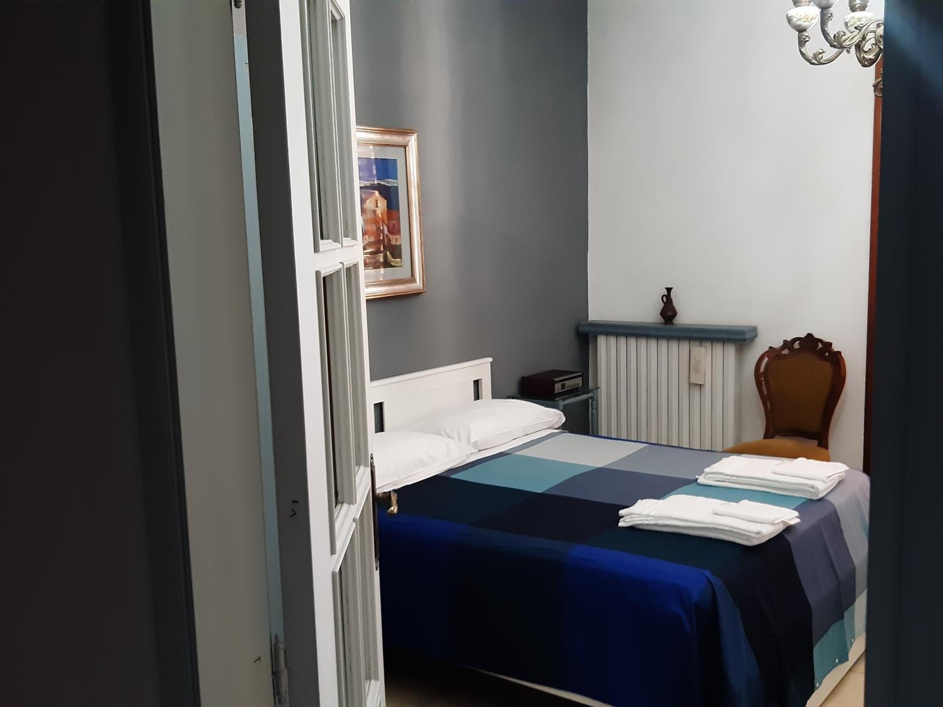Three-Bedroom House - Photo 27
