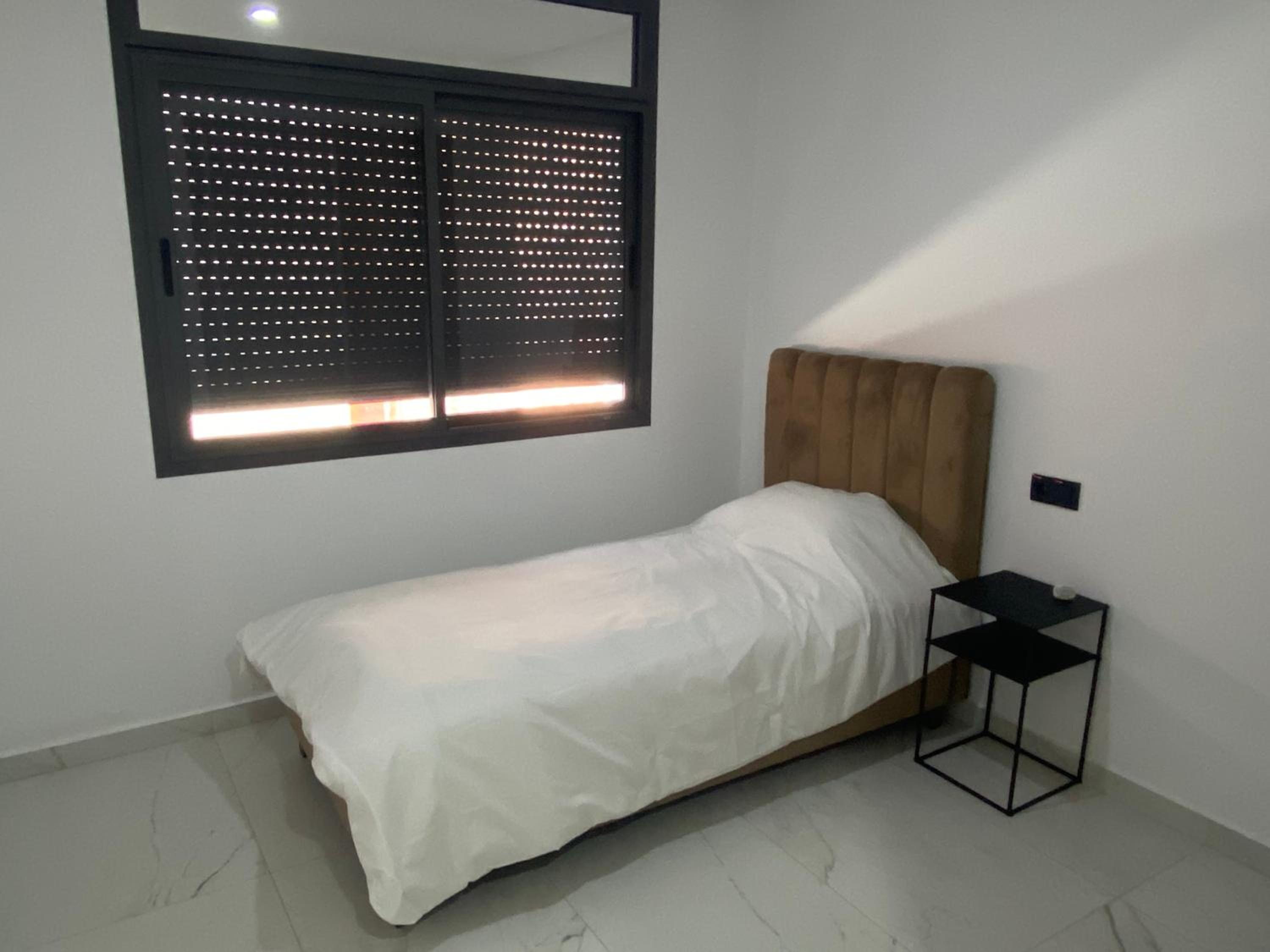Three-Bedroom Apartment - Photo 9