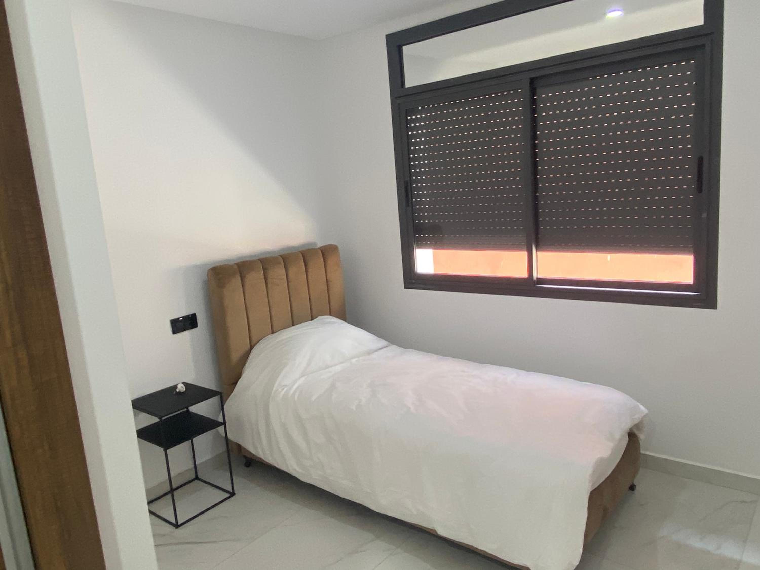 Three-Bedroom Apartment - Photo 4