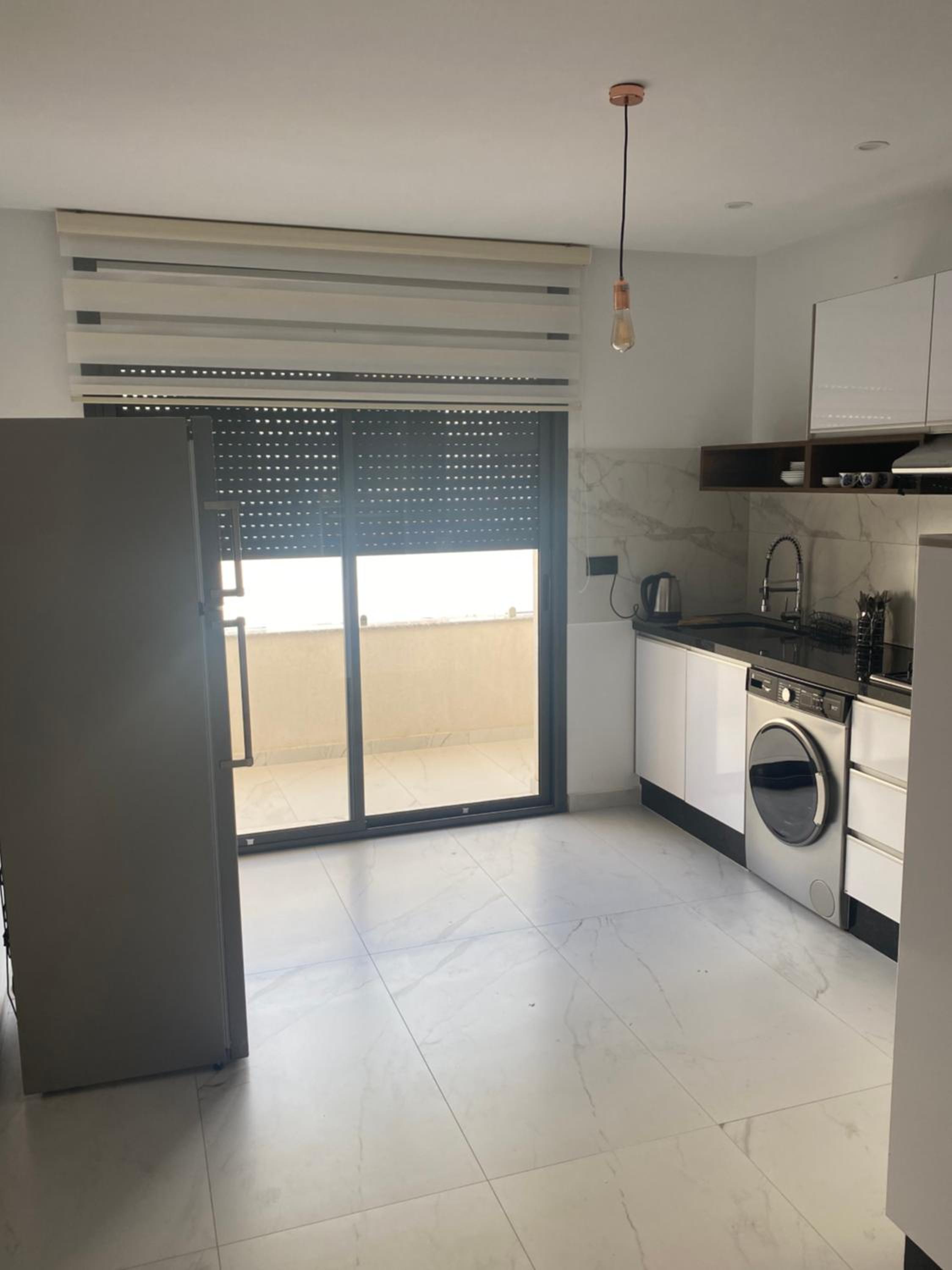 Three-Bedroom Apartment - Photo 10