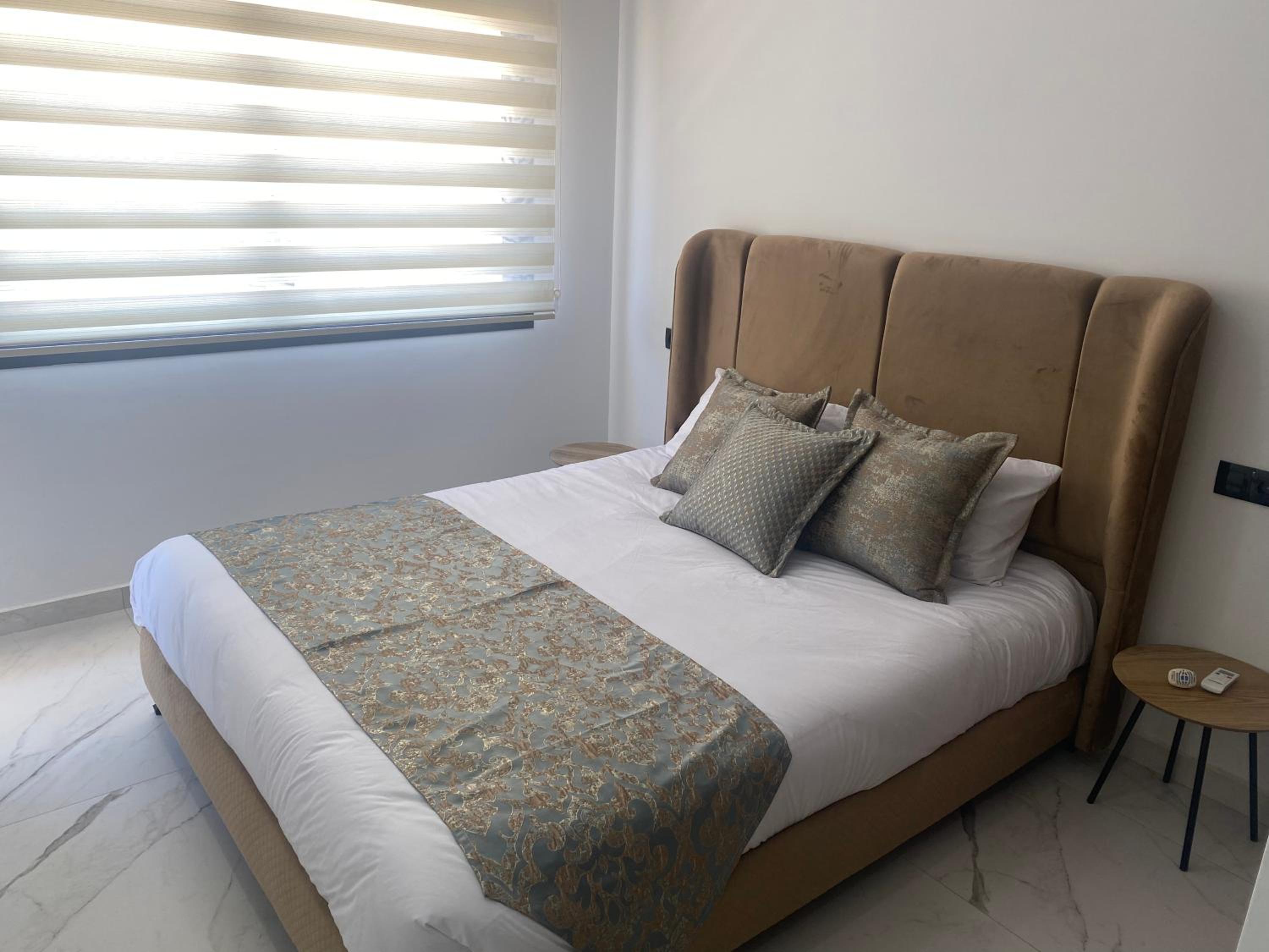 Three-Bedroom Apartment - Photo 12