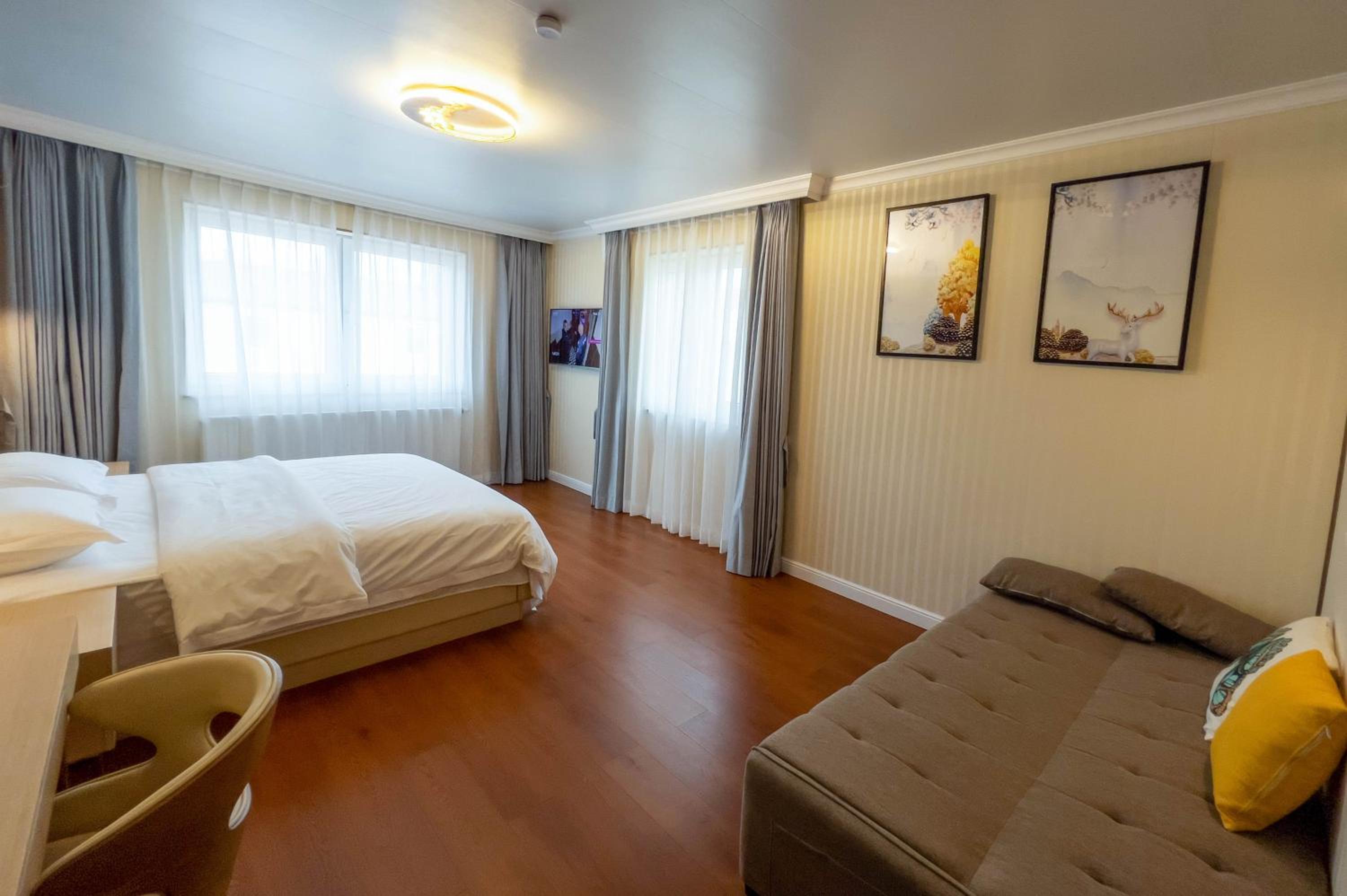 Deluxe Triple Room - Photo 1