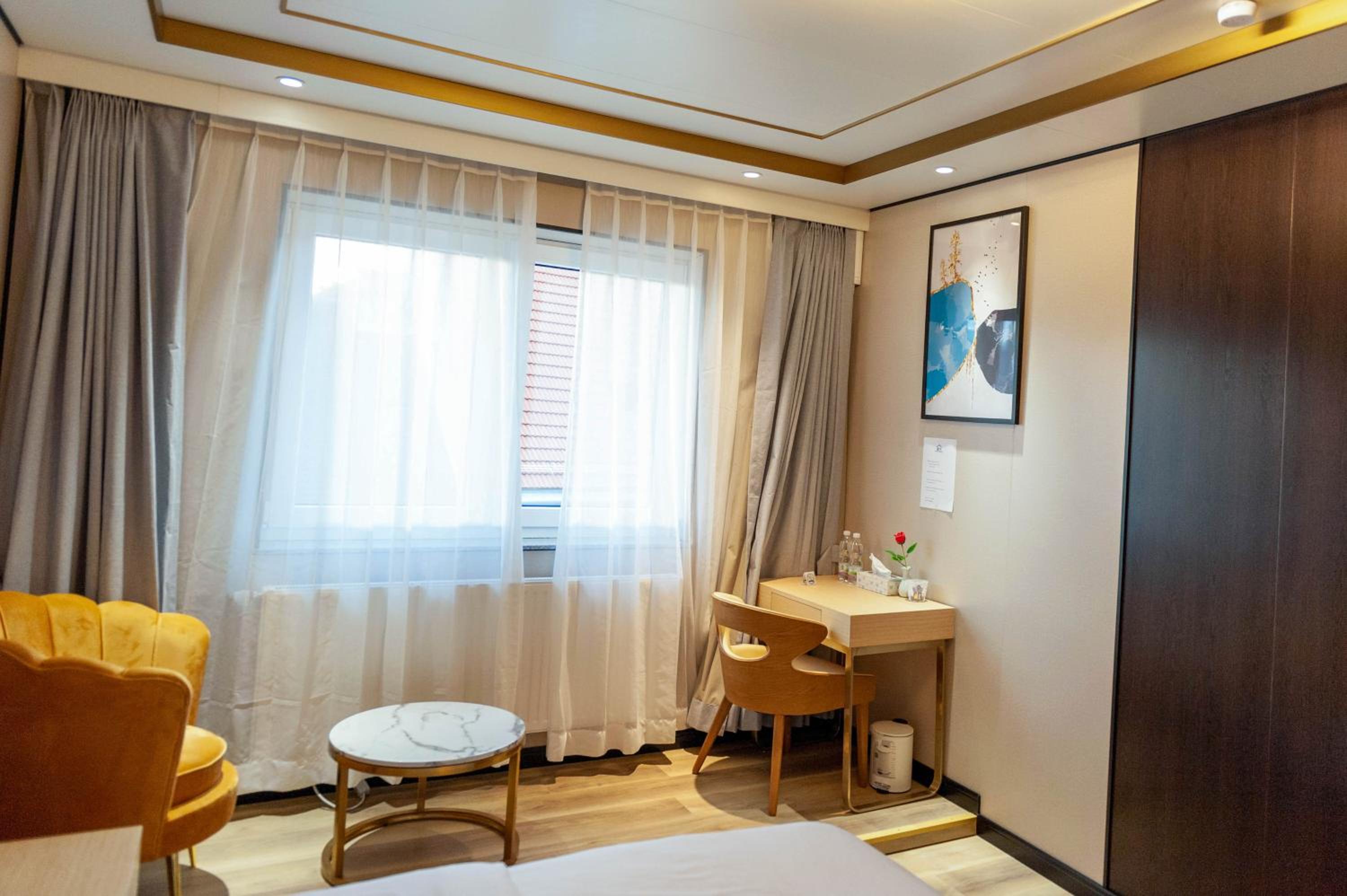 Deluxe Triple Room - Photo 8