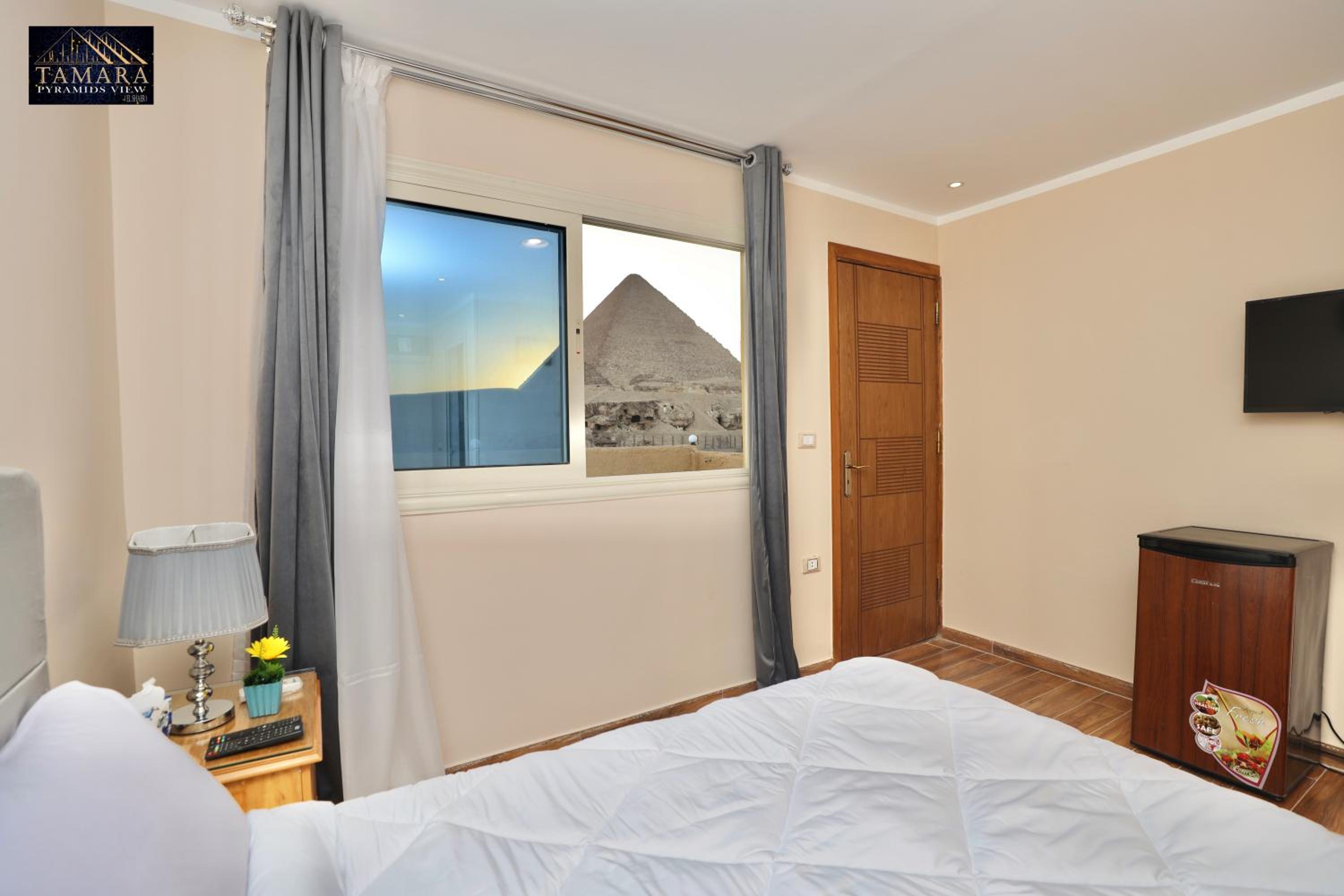 Deluxe Triple Room Panoramic Pyramids View