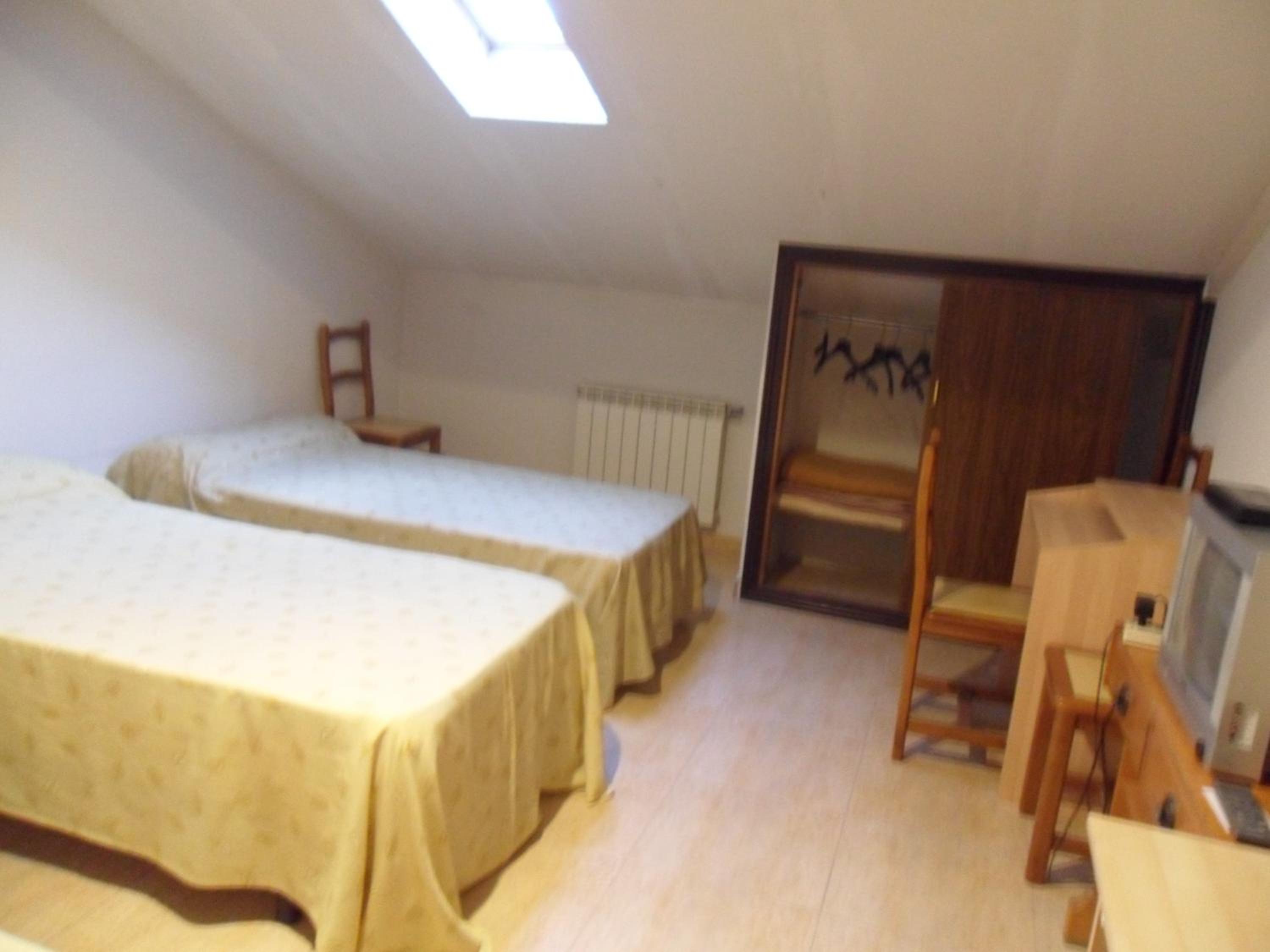 Habitación triple con baño