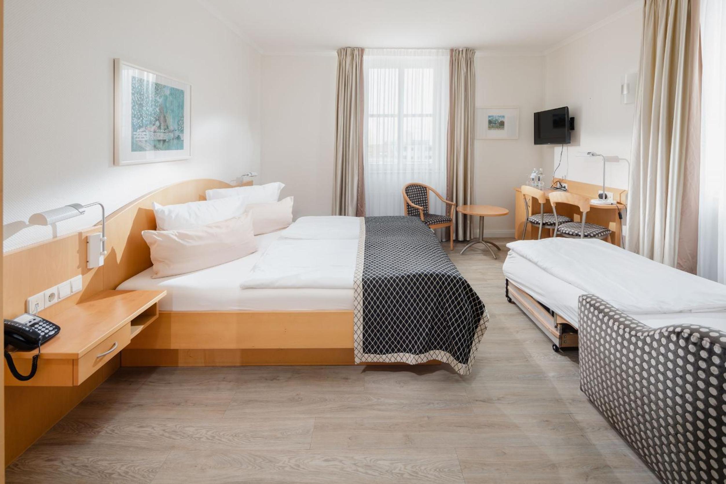 Deluxe Triple Room - Photo 7