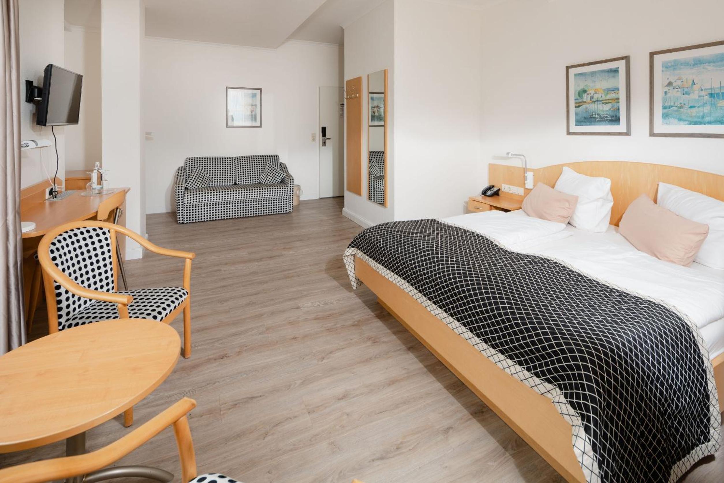 Deluxe Triple Room - Photo 1