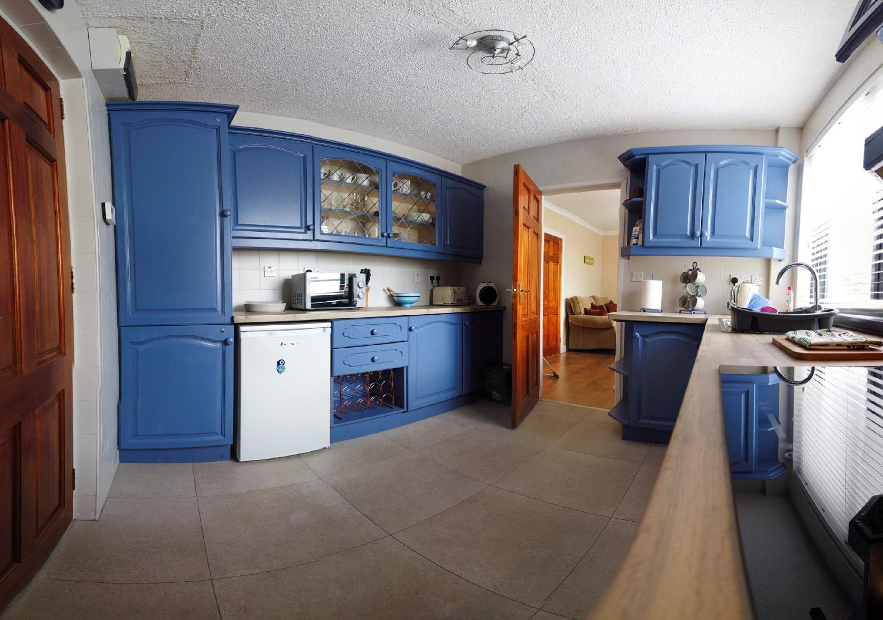 Three-Bedroom House - Photo 32