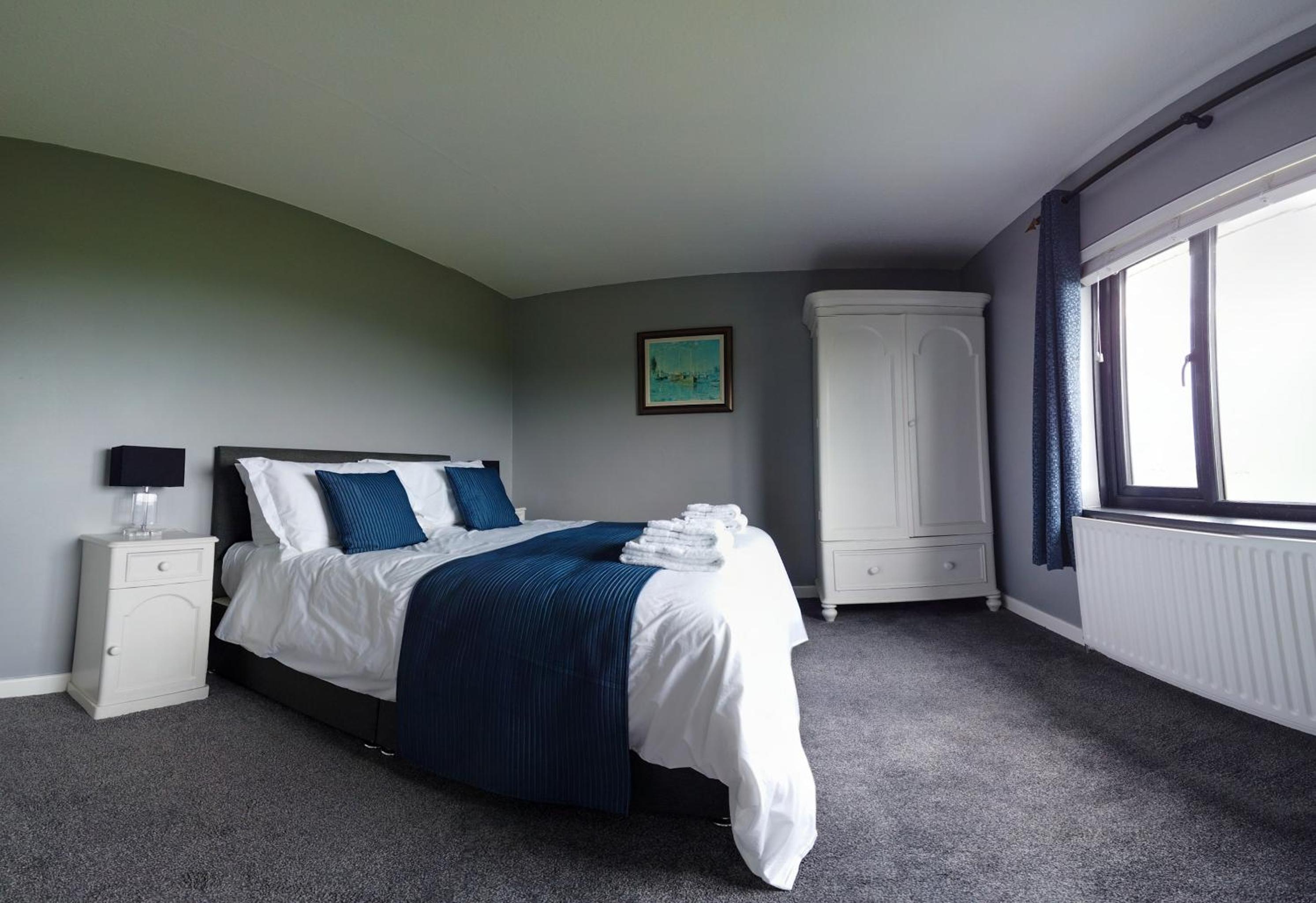 Three-Bedroom House - Photo 13