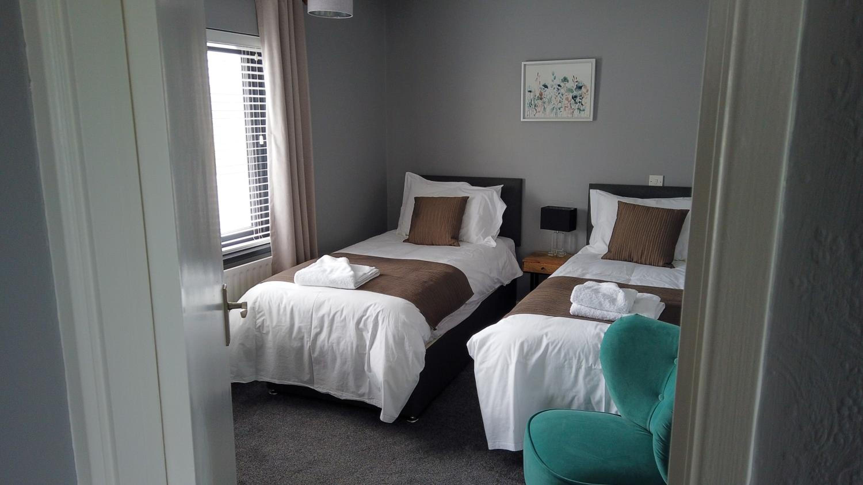 Three-Bedroom House - Photo 18