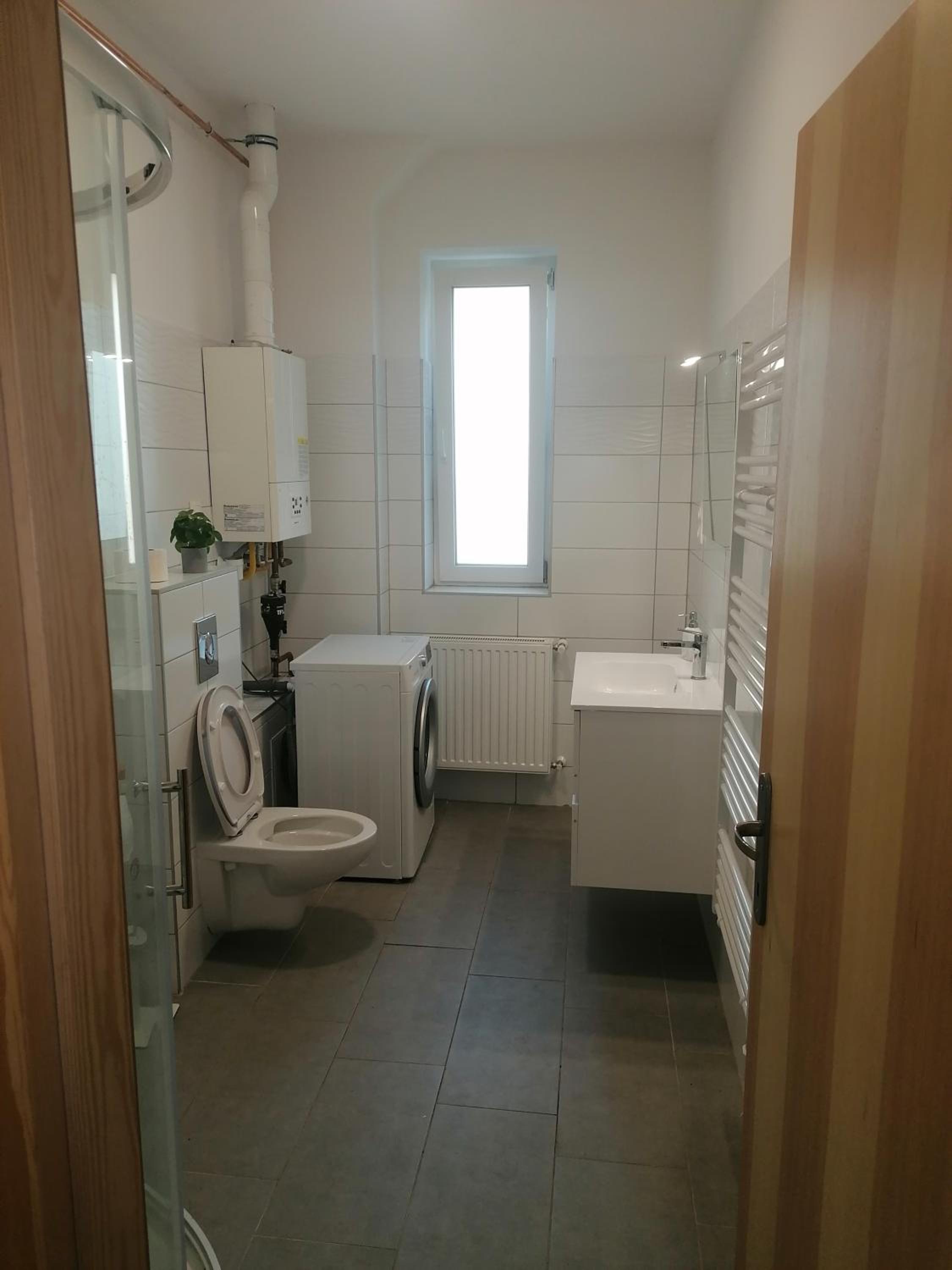 Three-Bedroom Apartment - Photo 3