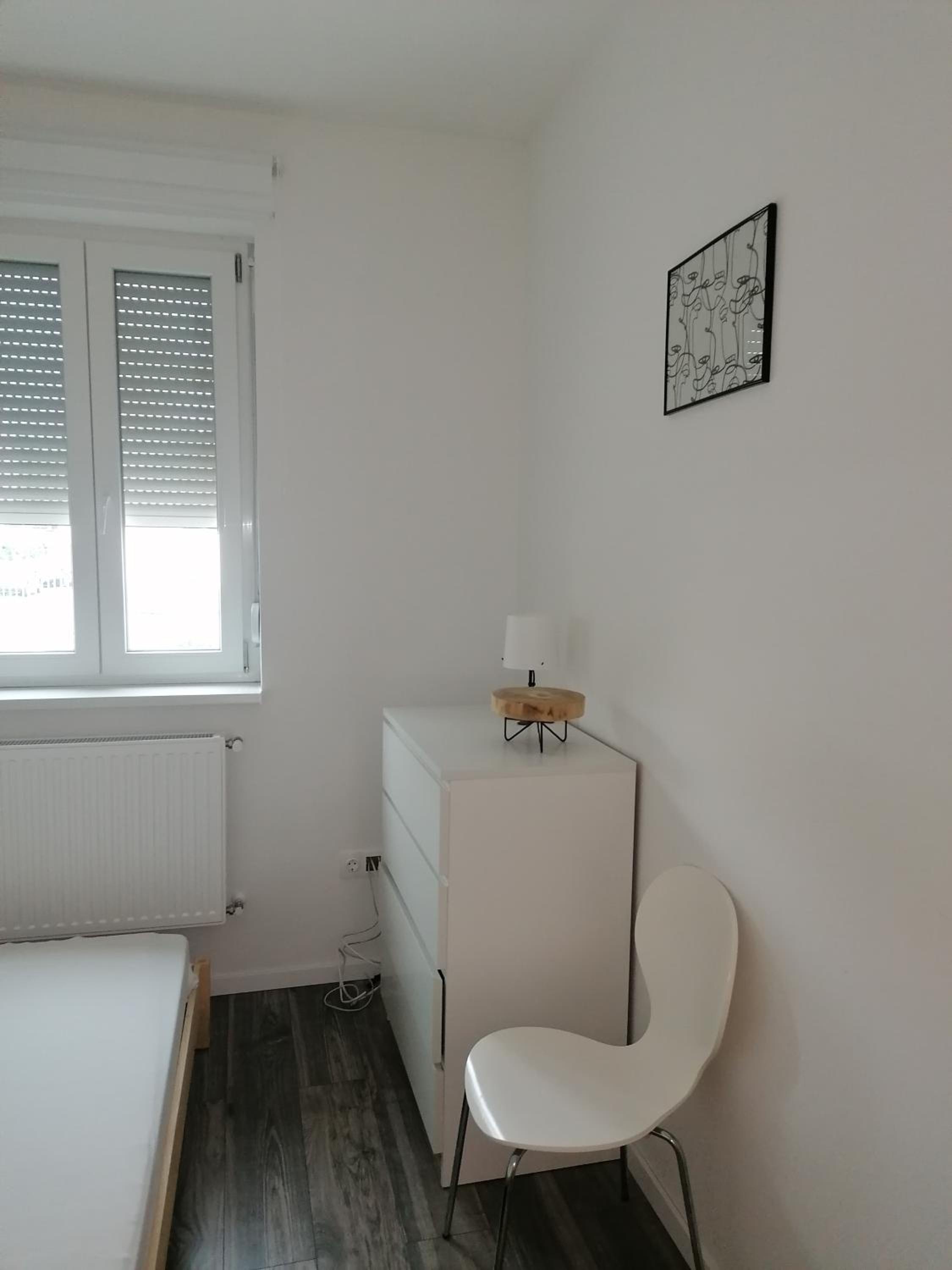 Three-Bedroom Apartment - Photo 6