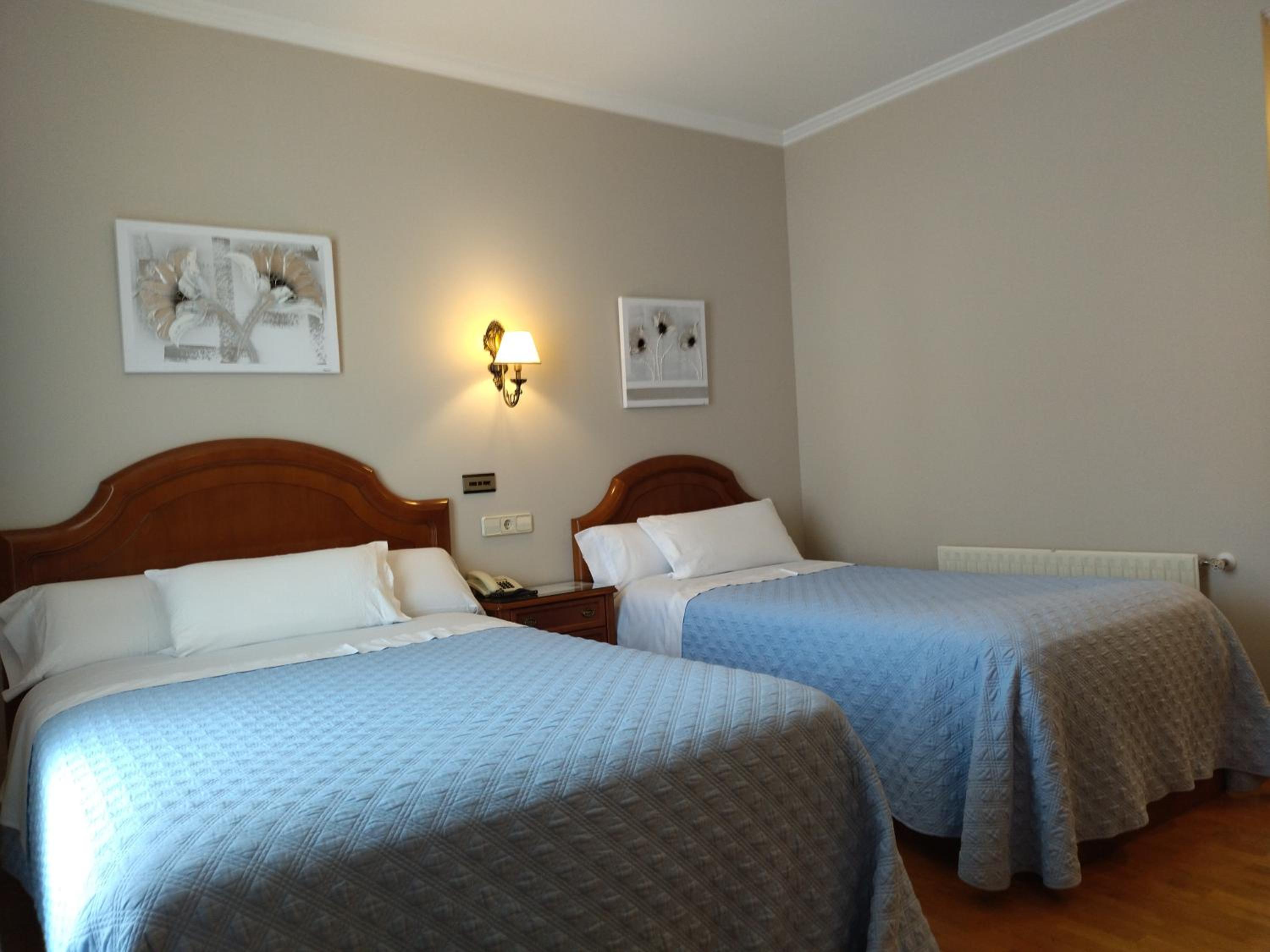 Habitación Triple con Balcón