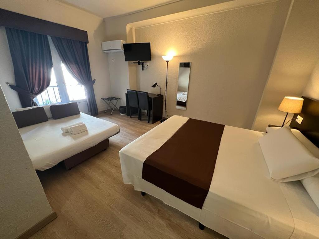 Habitación triple con cama adicional