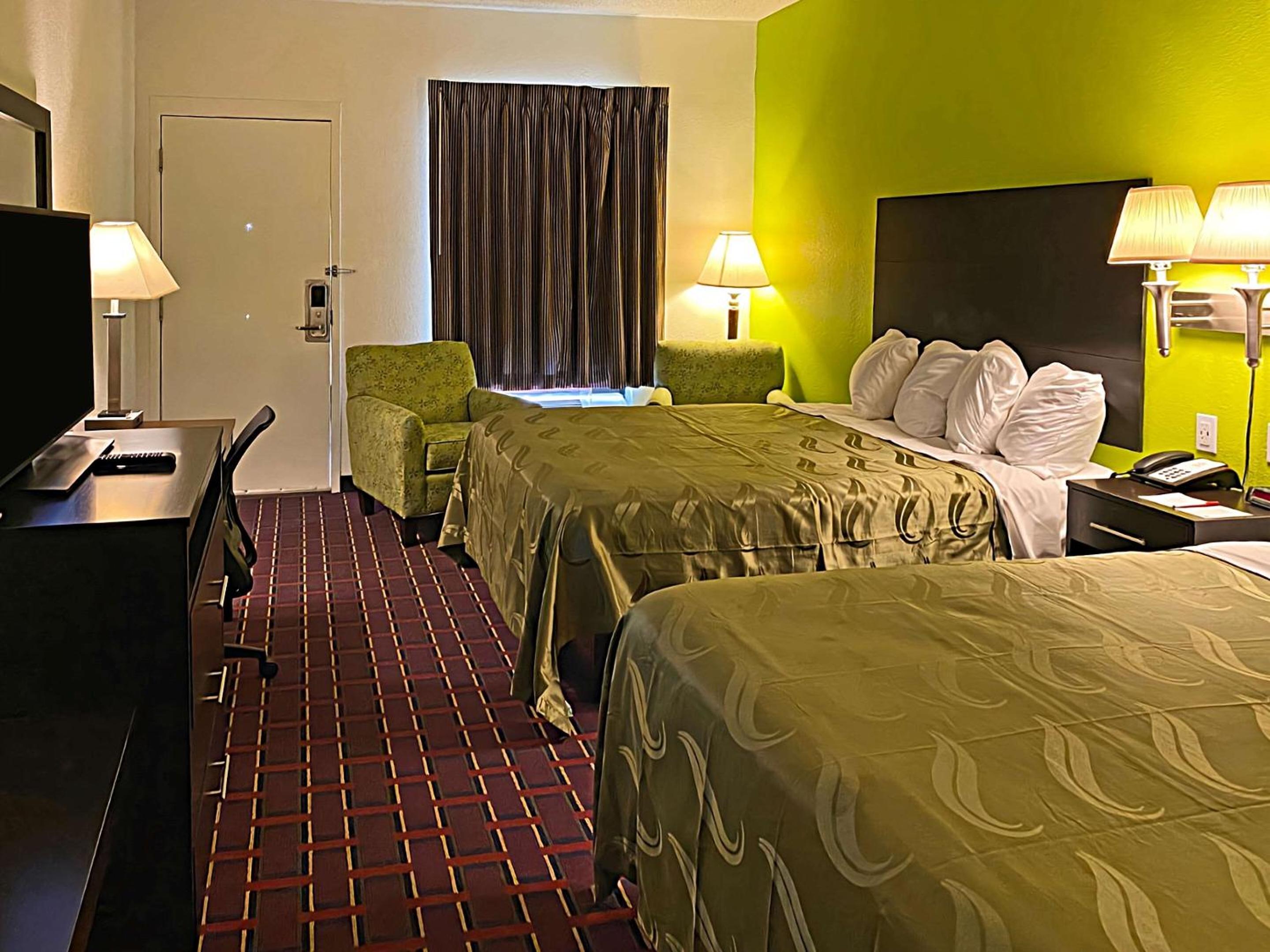 Queen Room with Two Queen Beds - Smoking - Photo 1