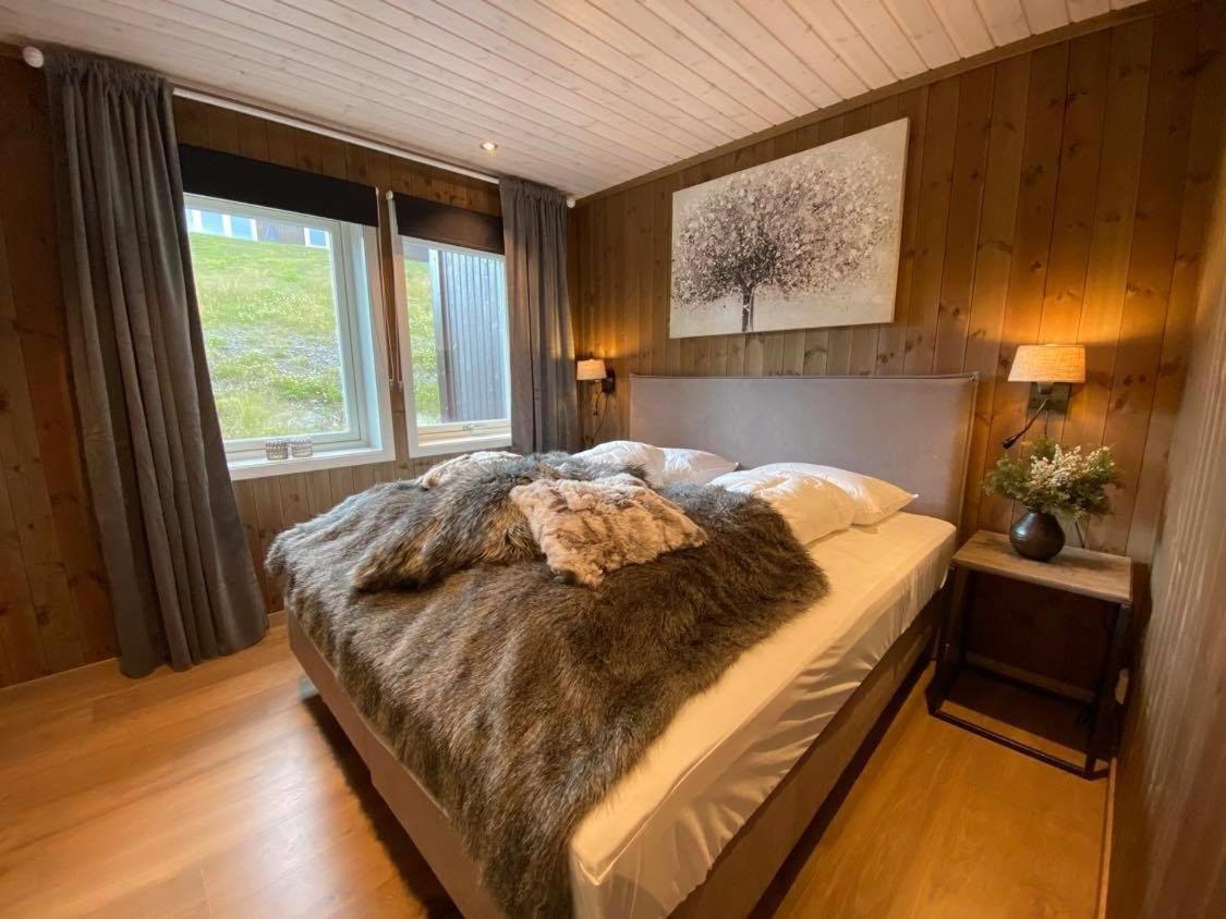Three-Bedroom Apartment - Photo 41