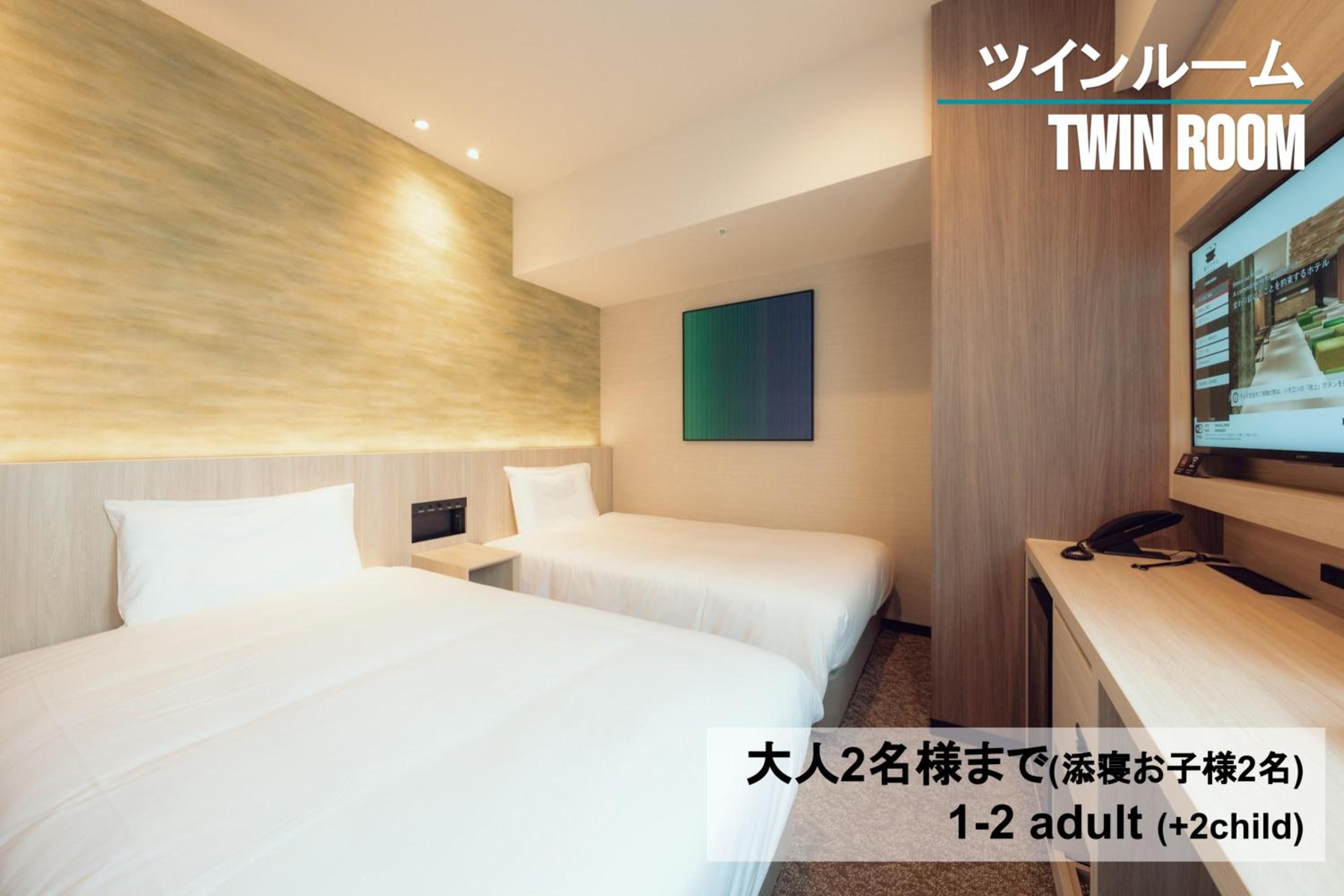 Standard Twin Room - Photo 8