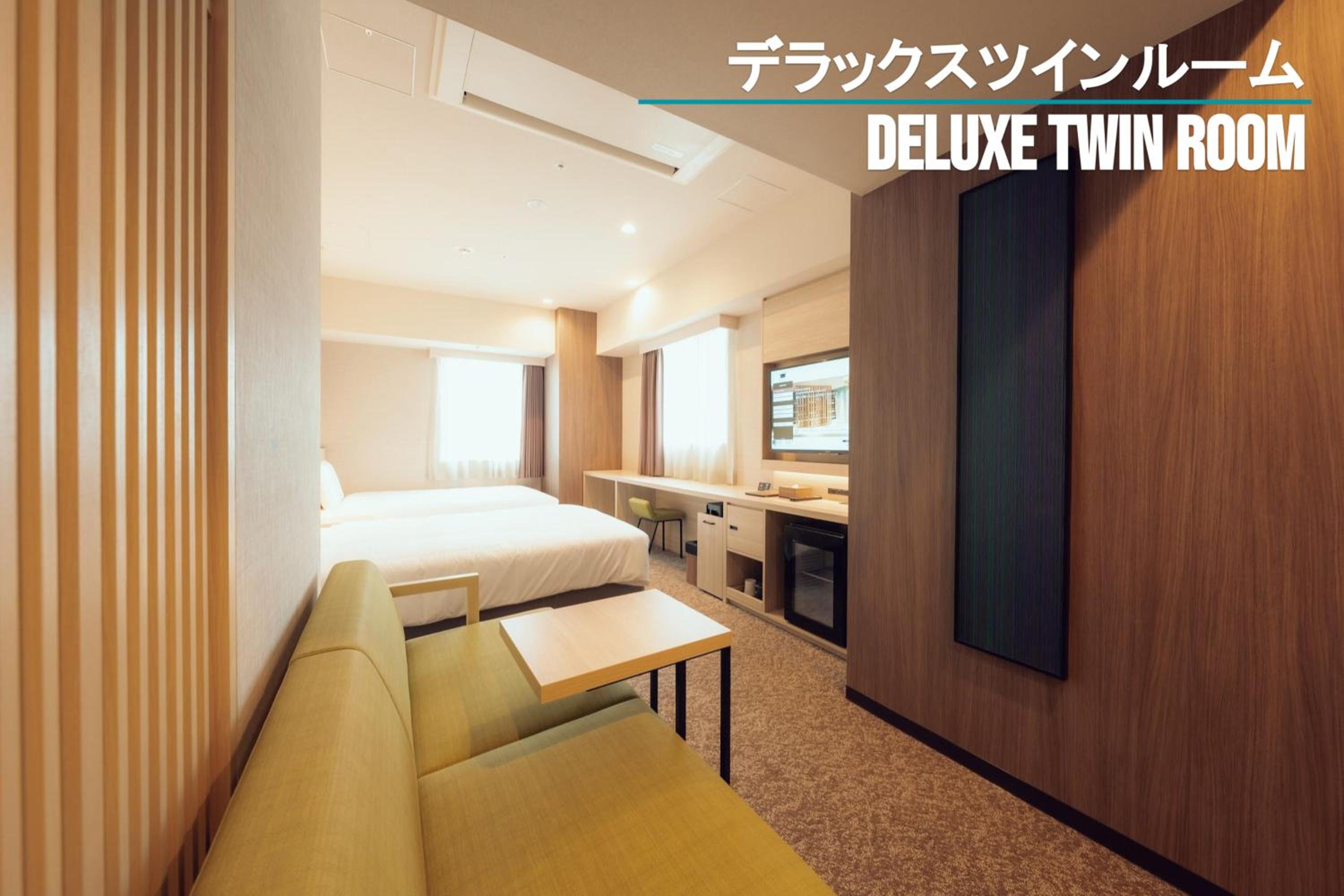 Deluxe Twin Room - Photo 12