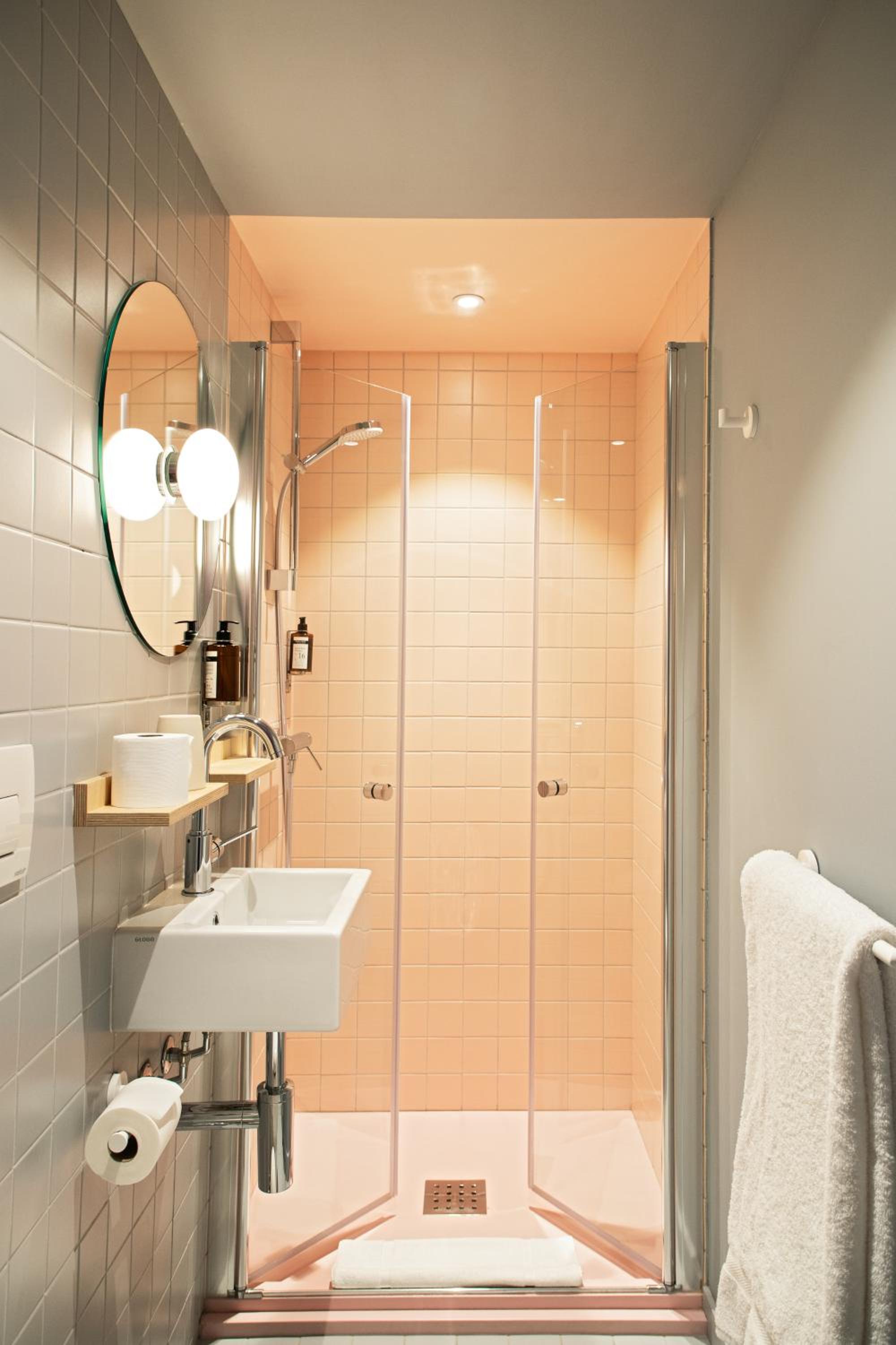Modern bathroom with walk-in shower and sink