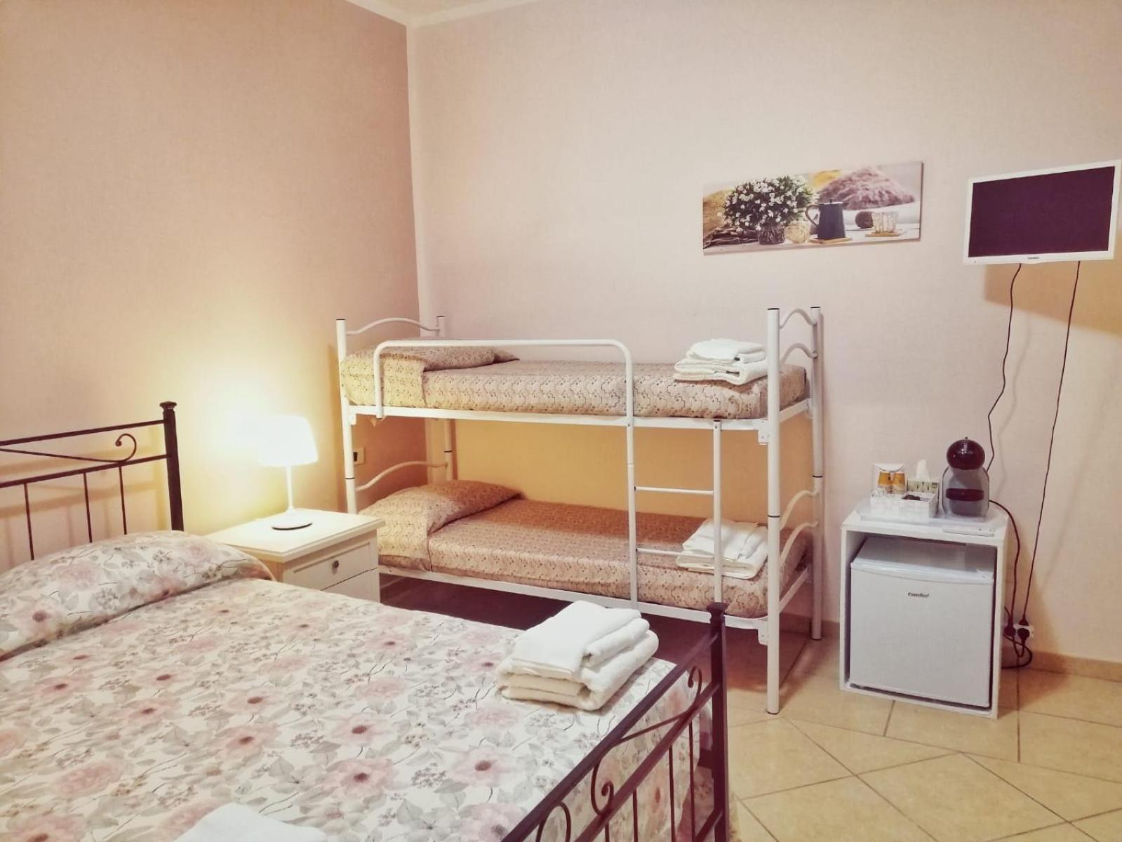 Quadruple Room with Balcony photo 3