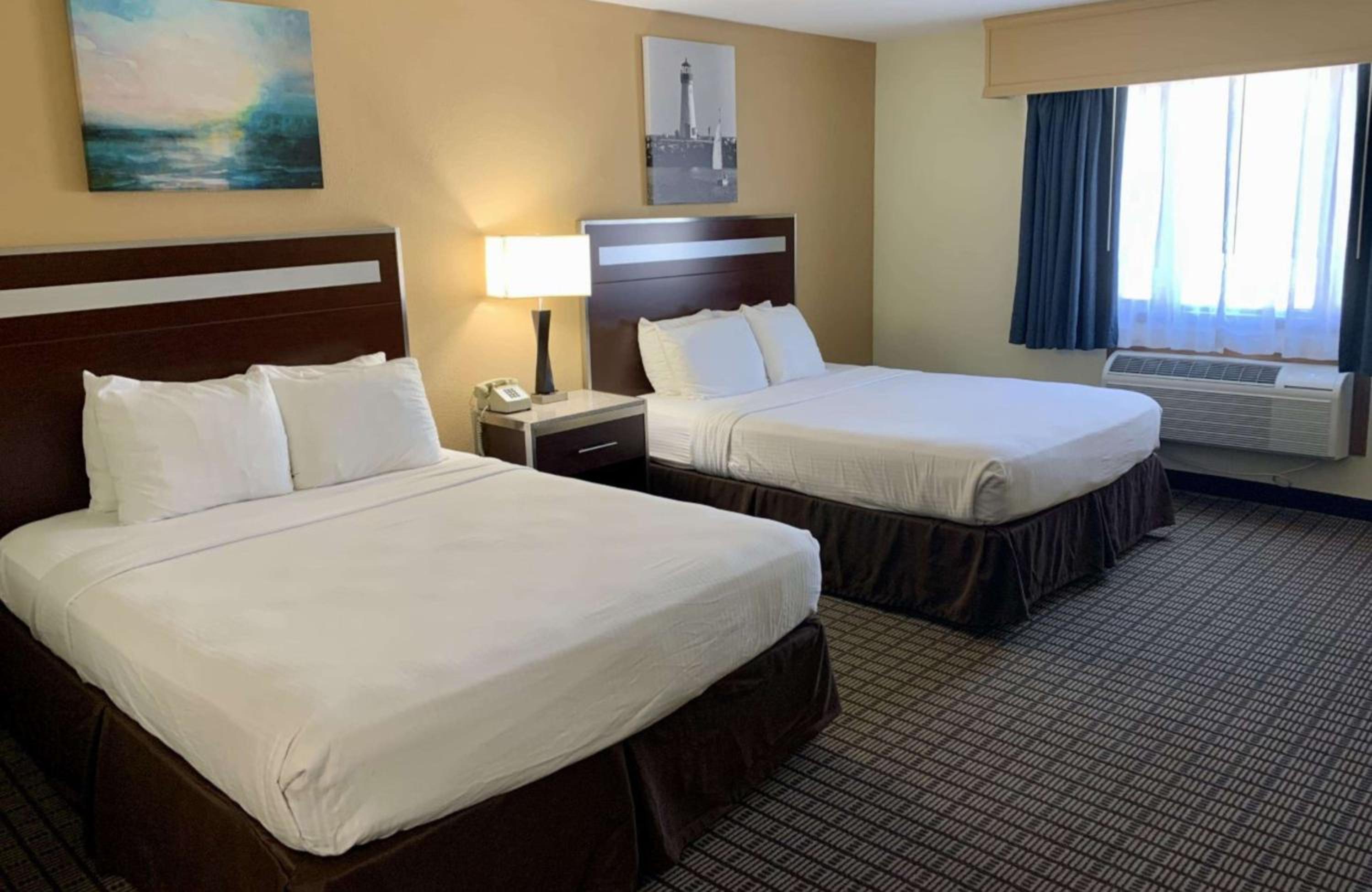 Deluxe Queen Room with Two Queen Beds - Non-Smoking photo 1