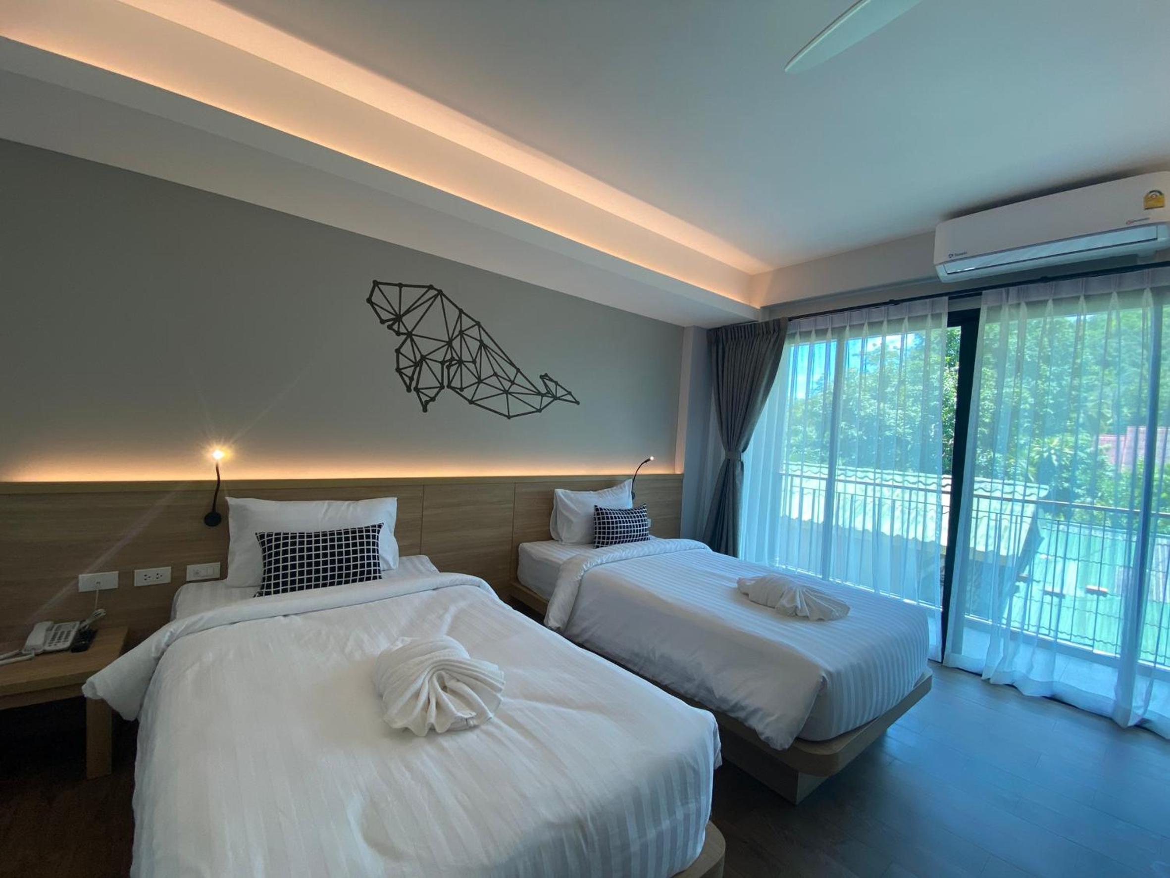 Deluxe Twin Room - Photo 2