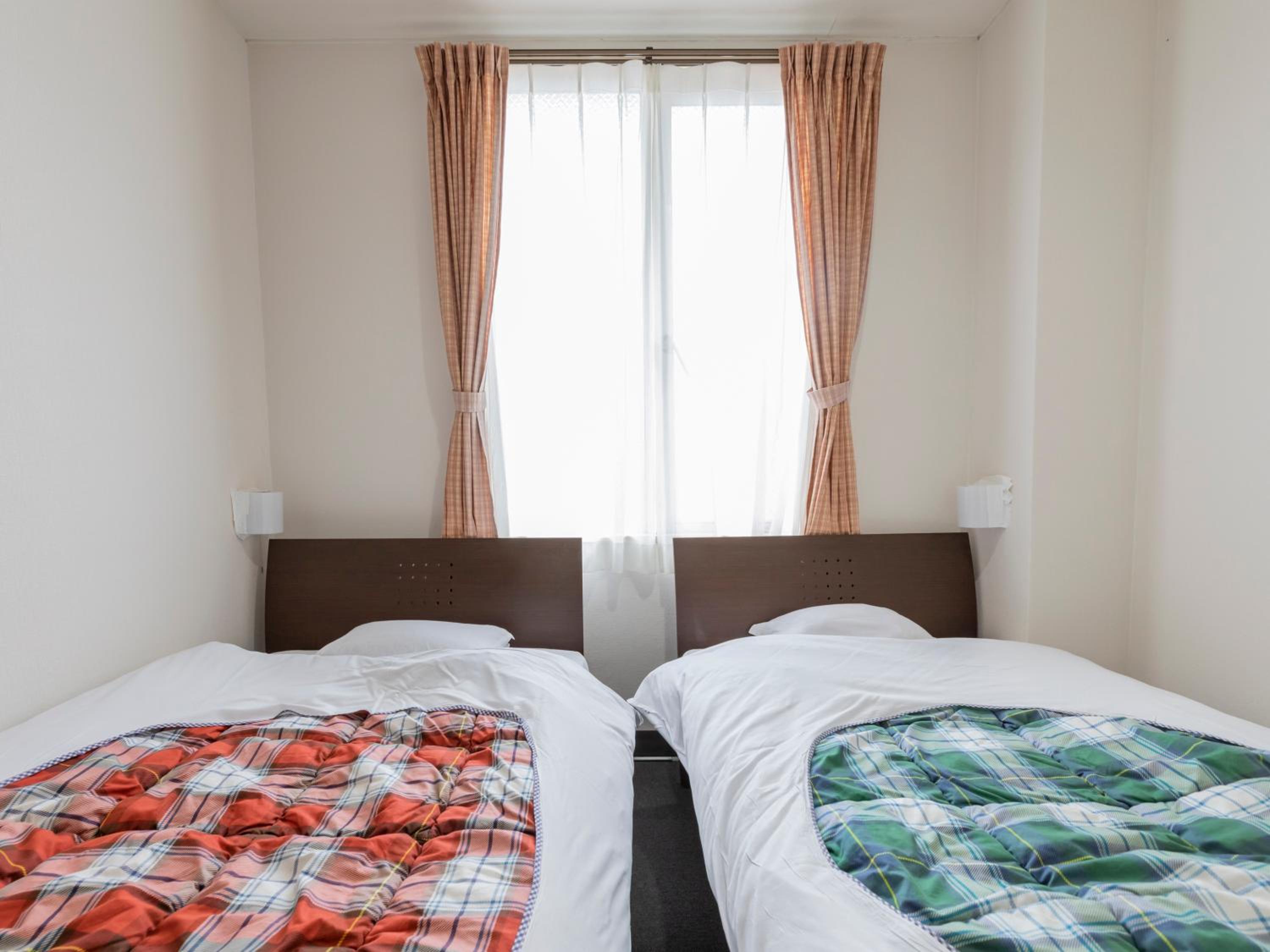 Twin Room - Photo 1
