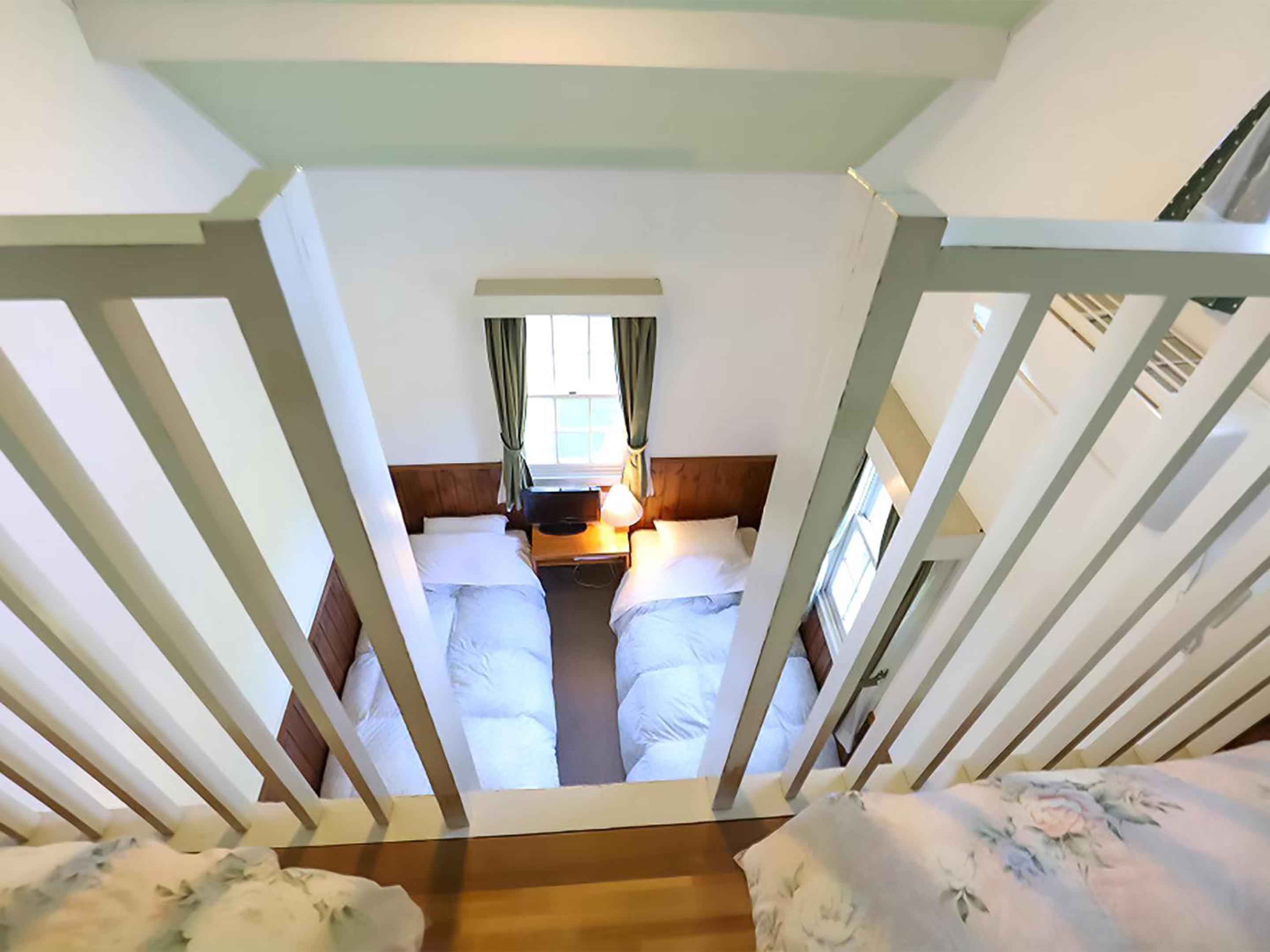 Quadruple Room with Shared Bathroom and Loft Area photo 3